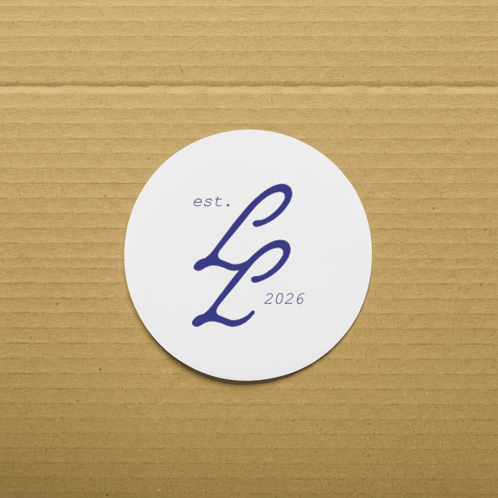 Circular logo application displayed on a textured surface, highlighting the simplicity and versatility of the mark.