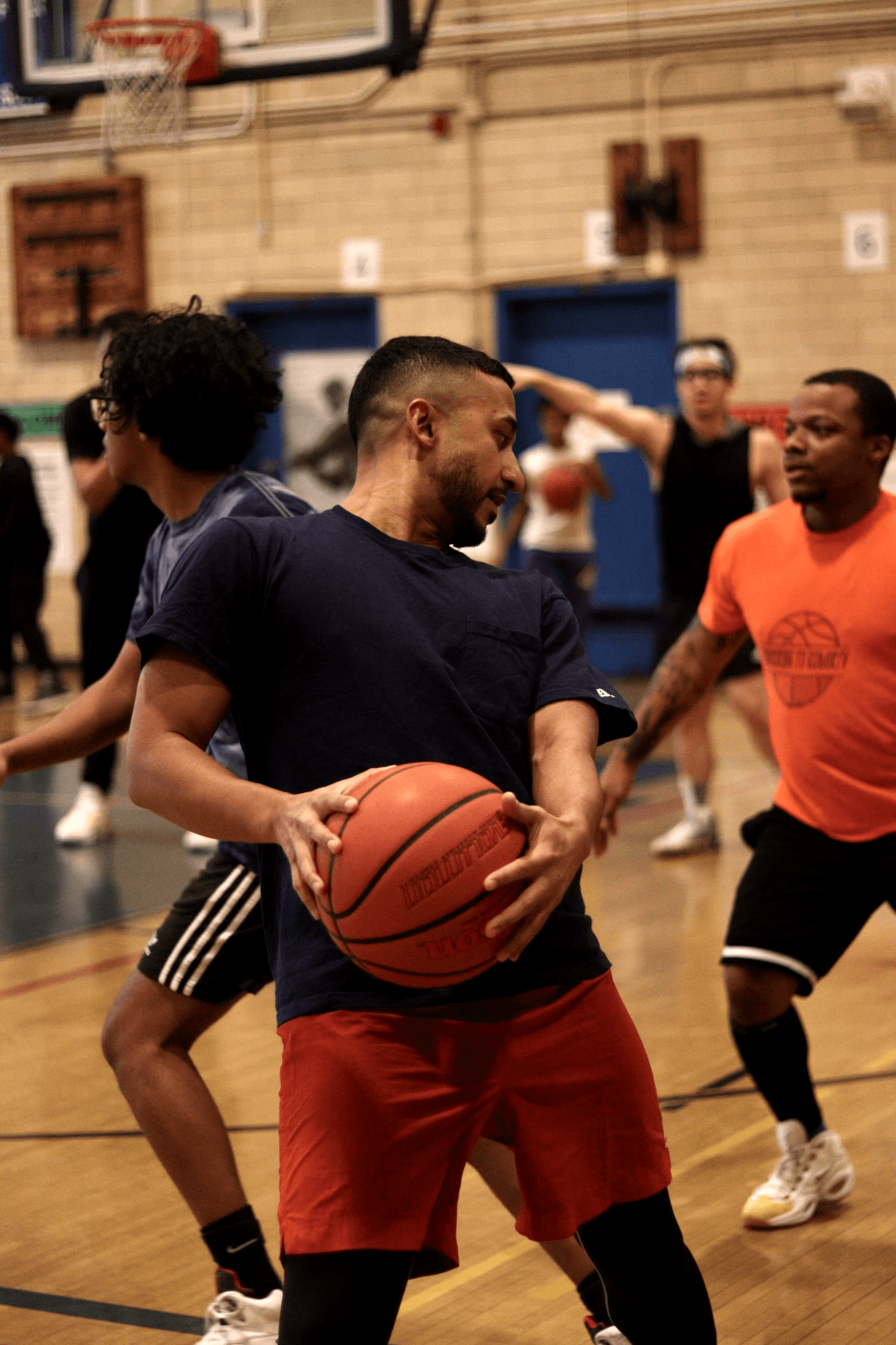 Doctor Ein playing basketball in a nearby court in queens