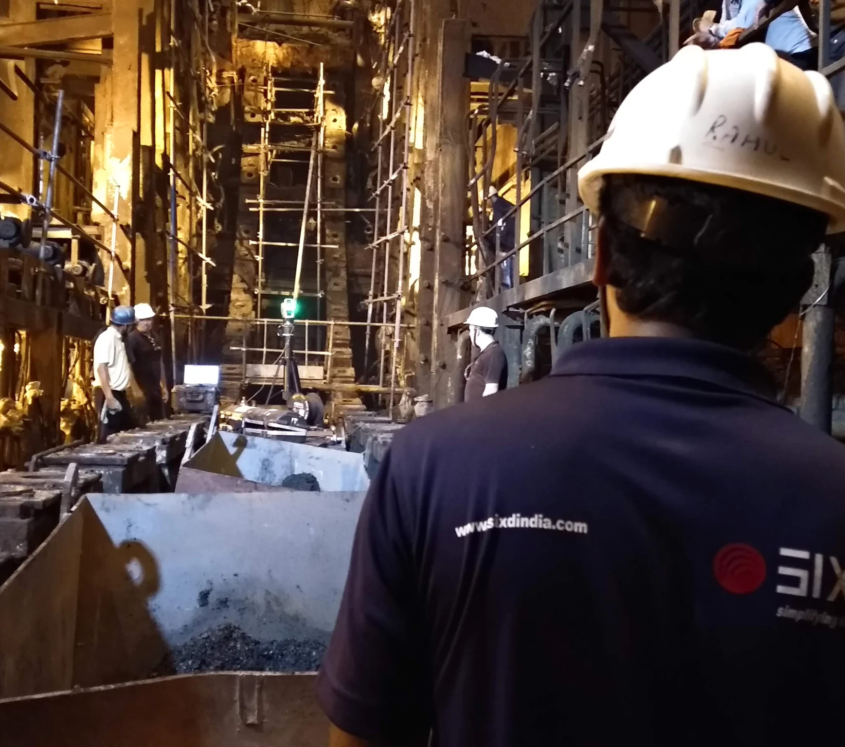 a large display of blue lights in a dark room