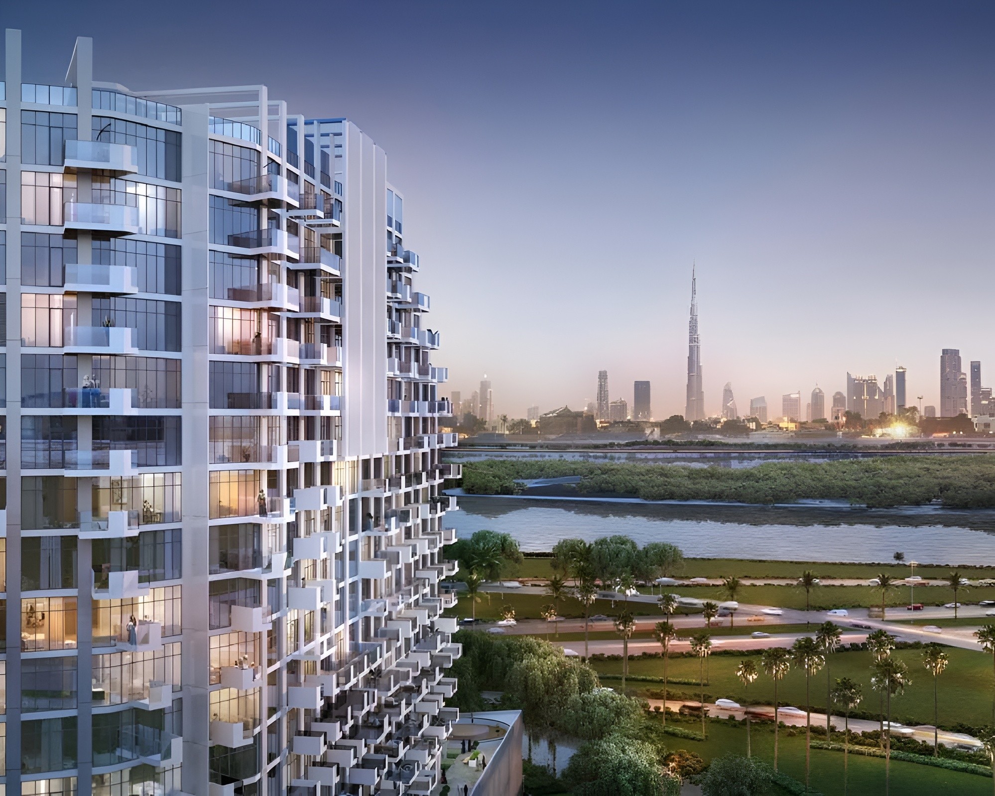 Close-up of modern balcony glass railings at a premium residential tower overlooking the Dubai canal.