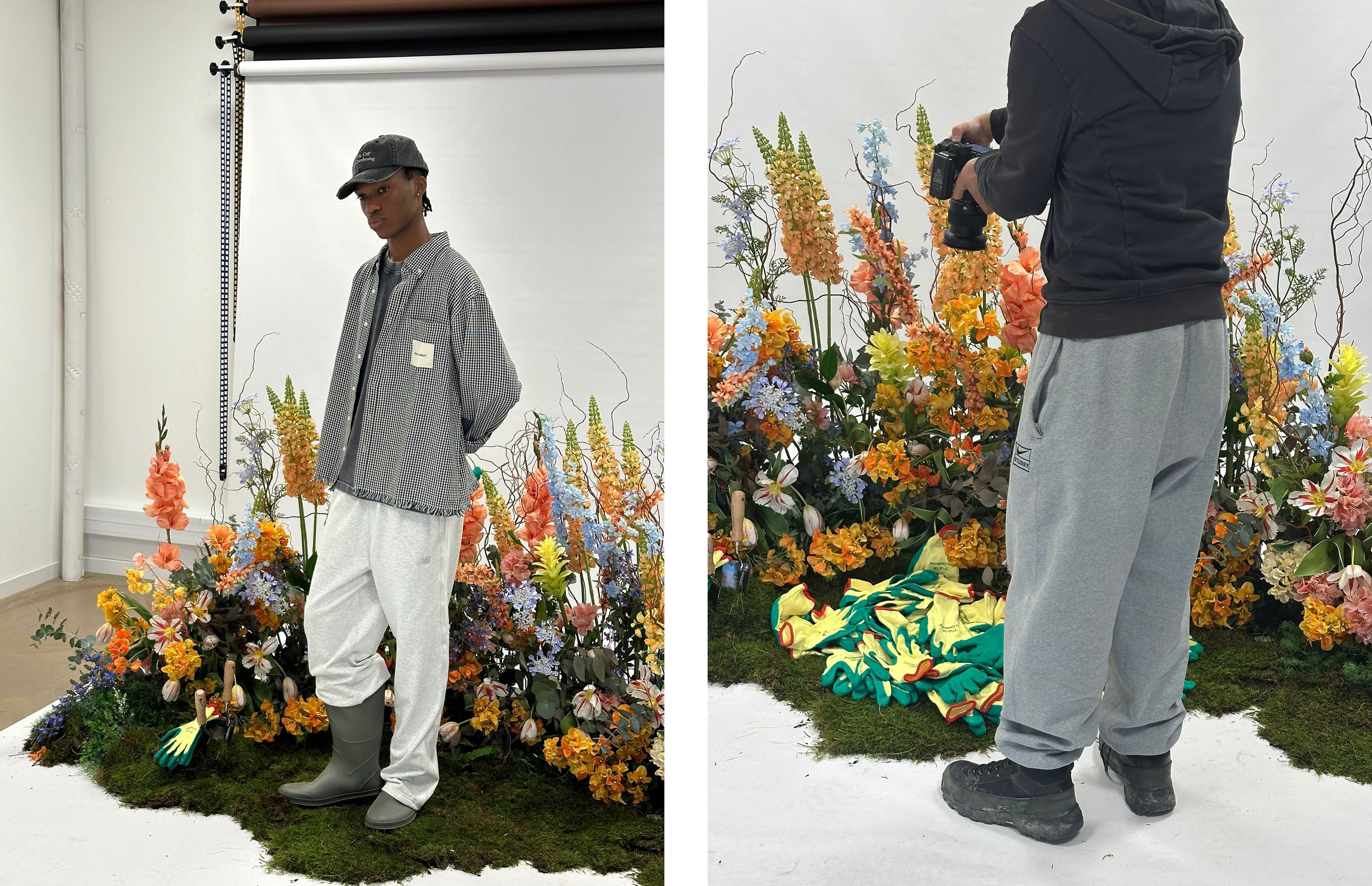 Shooting en intérieur ou lemannequin porte chemise à carreaux et pantalon clair, avec un parterre de fausses fleurs à ses pieds