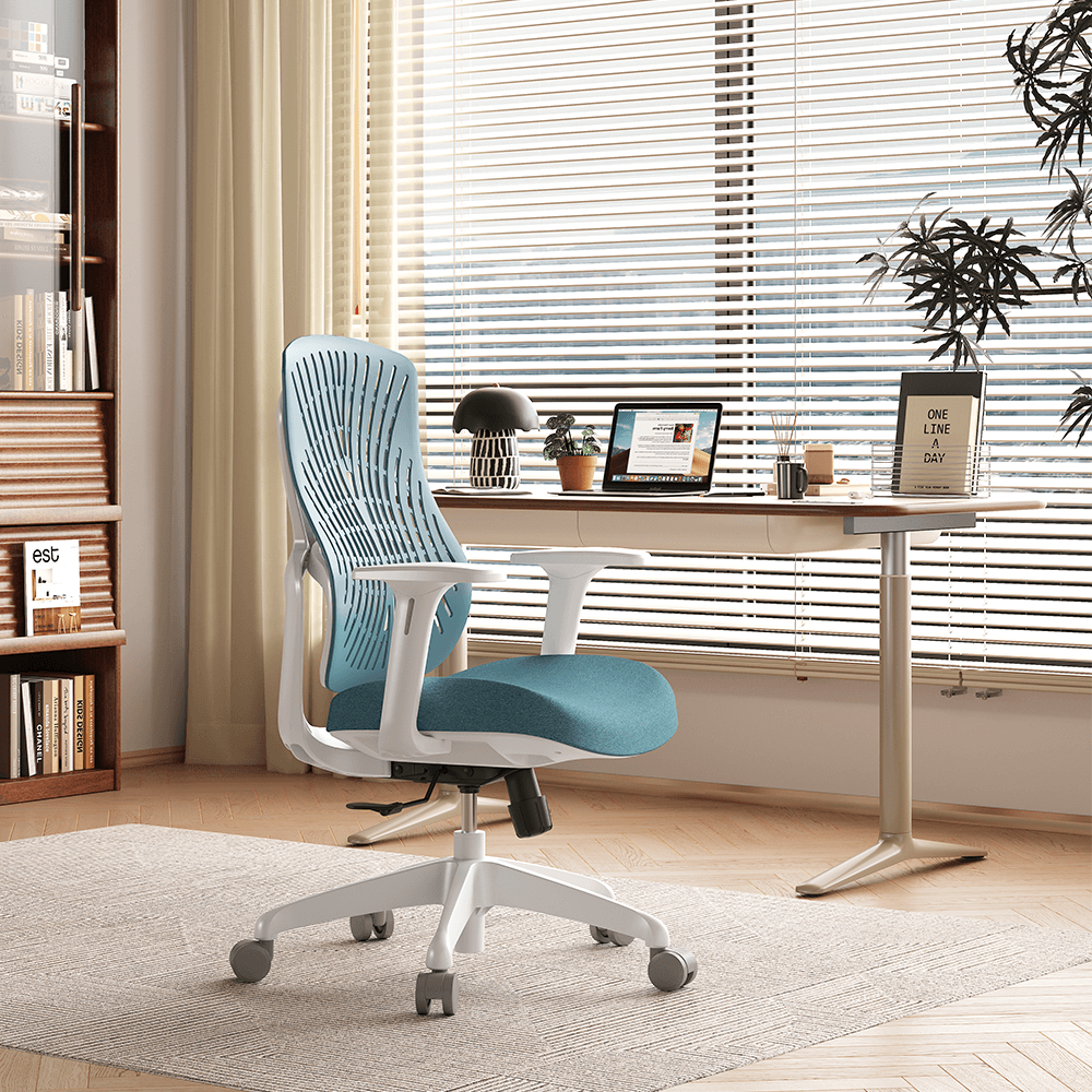TCHOD 872A ergonomic office chair with a blue soft elastic TPE backrest and white frame in a modern home office setting with a minimalist desk and natural window light.