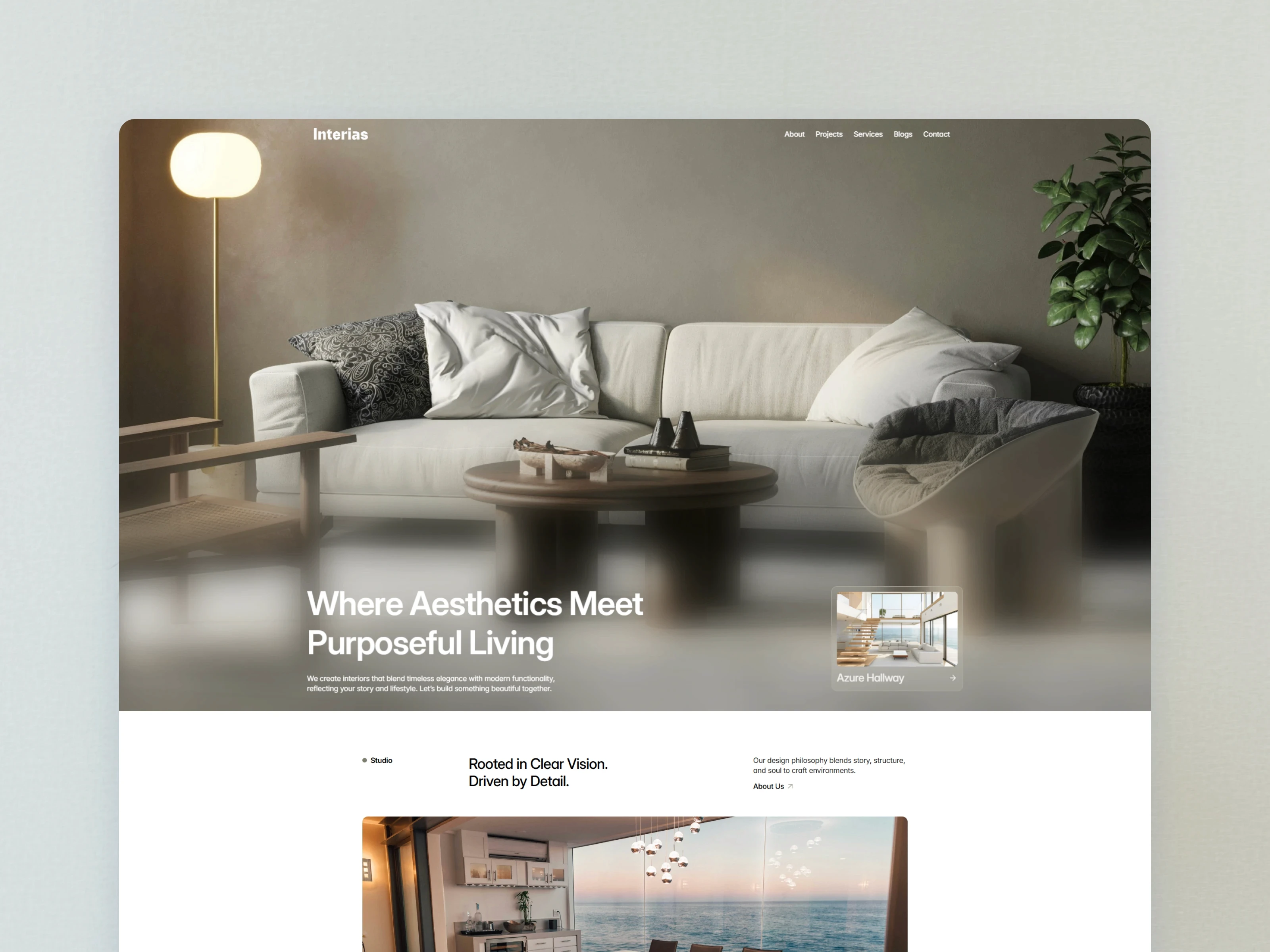 Interias interior design website featuring a modern living room with a white sofa and warm lighting.