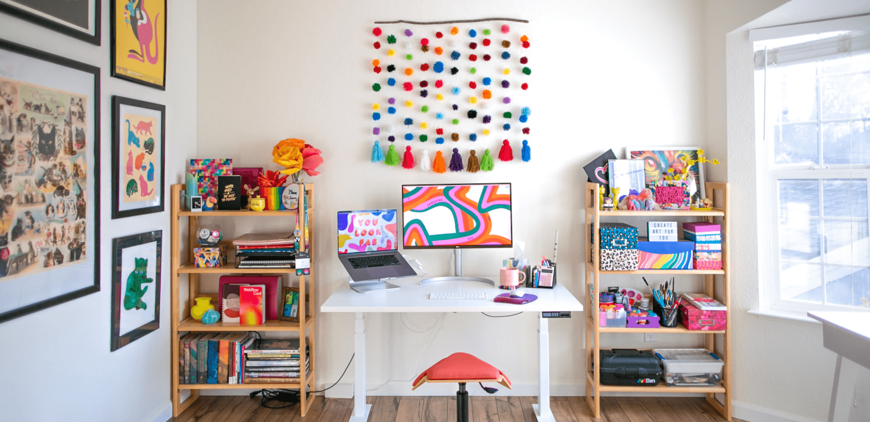 A photo of a colorful office, the workplace of Design Gal Studio.