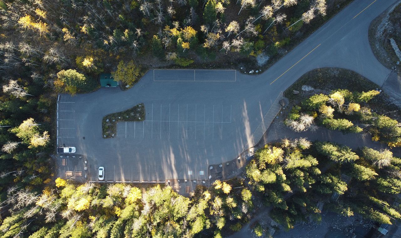 Overhead view of Widowmaker day use parking lot integrated with native vegetation in Kananaskis