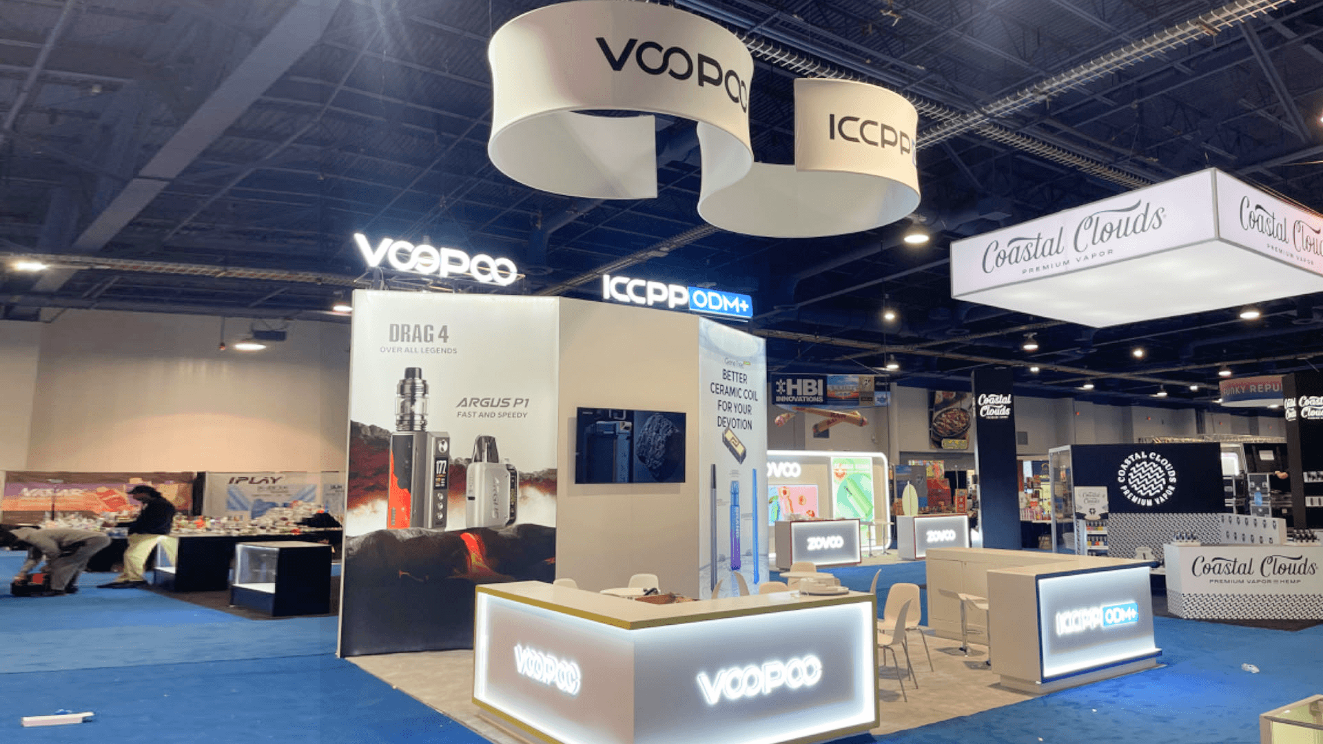 Alternative products booth at Las Vegas Convention Center set with product wall and compact meeting area for buyer discussions