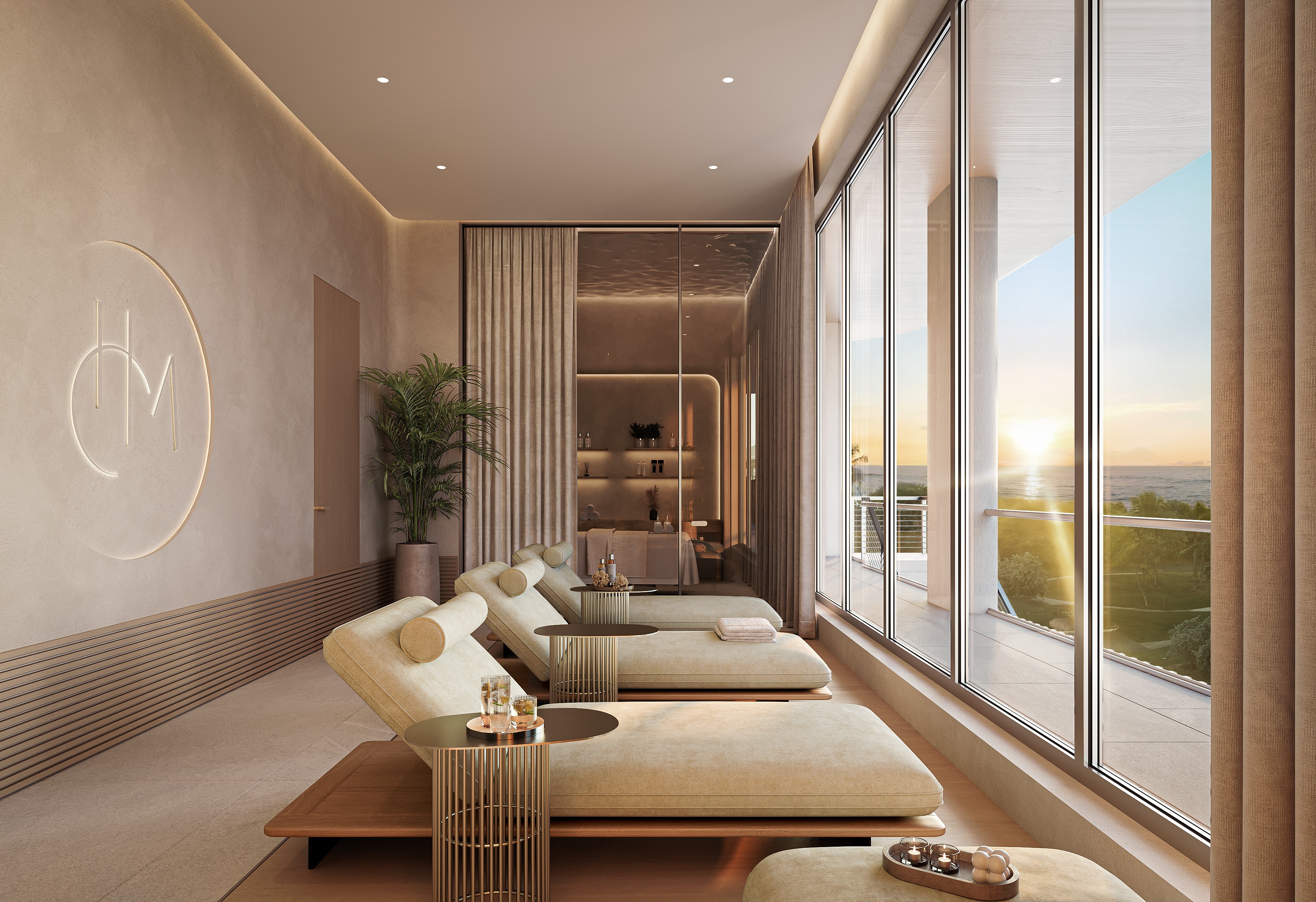 Spa lounge with plush seating and large windows overlooking the ocean at Hollywood Moon: new construction Hollywood FL.
