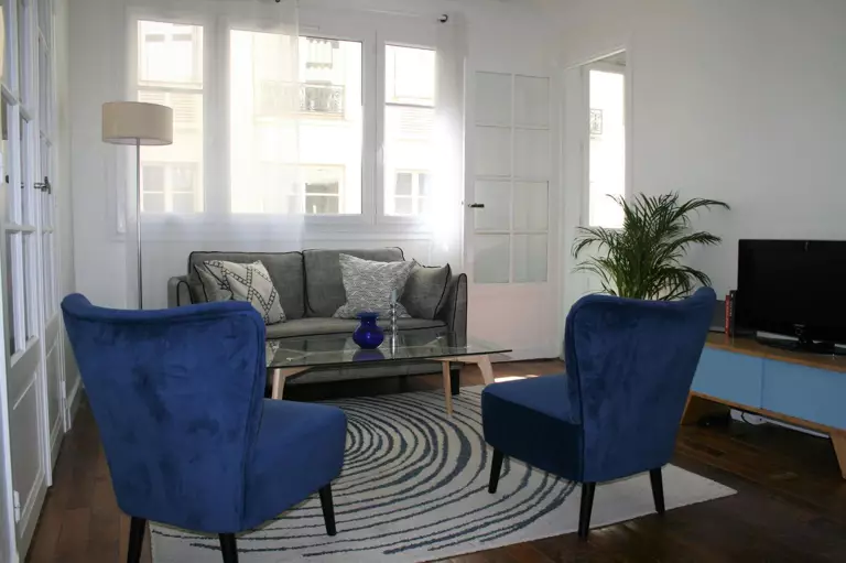 a kitchen with a sink and a stove top oven