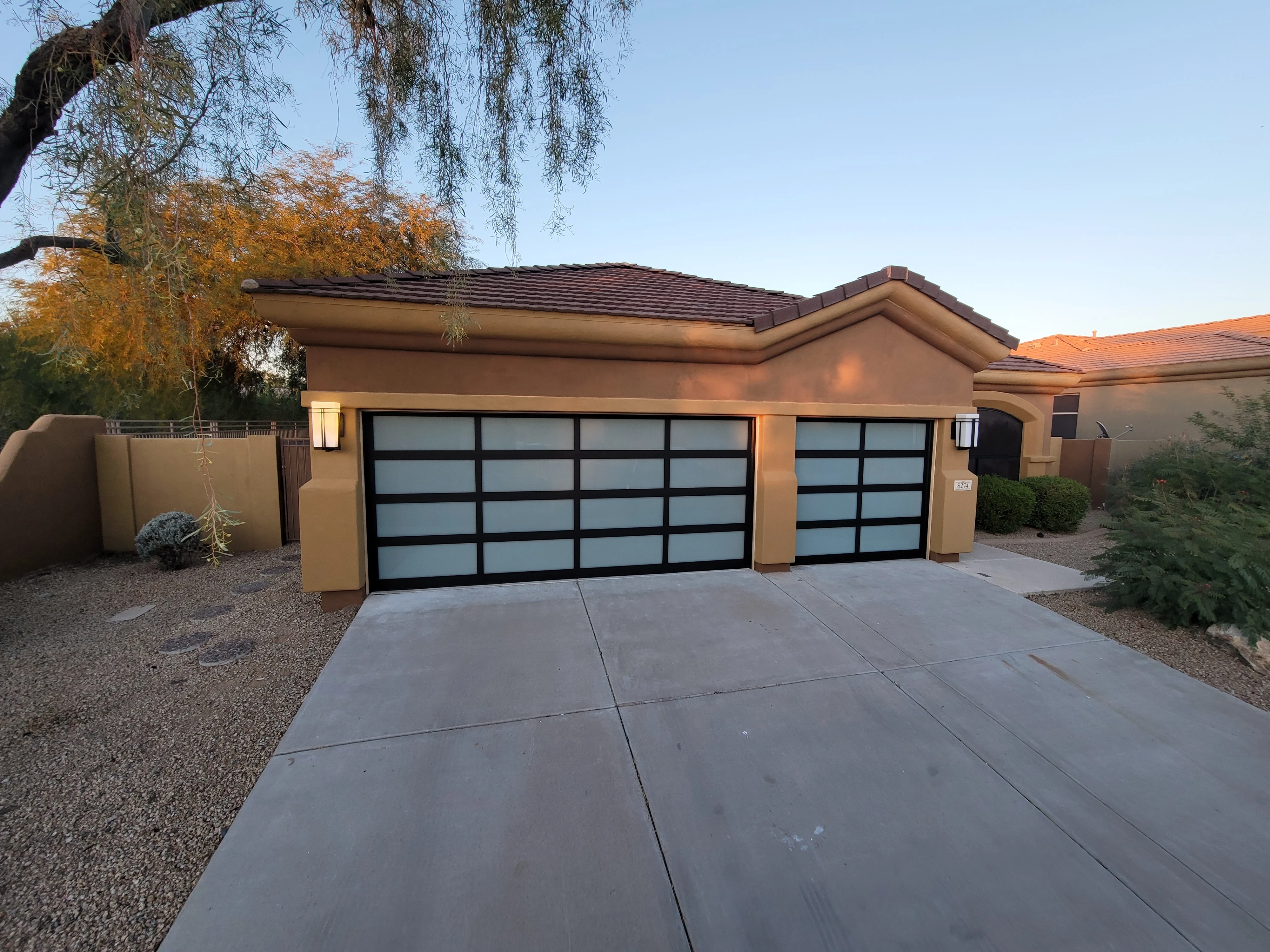 Arizona home with a modern garage door