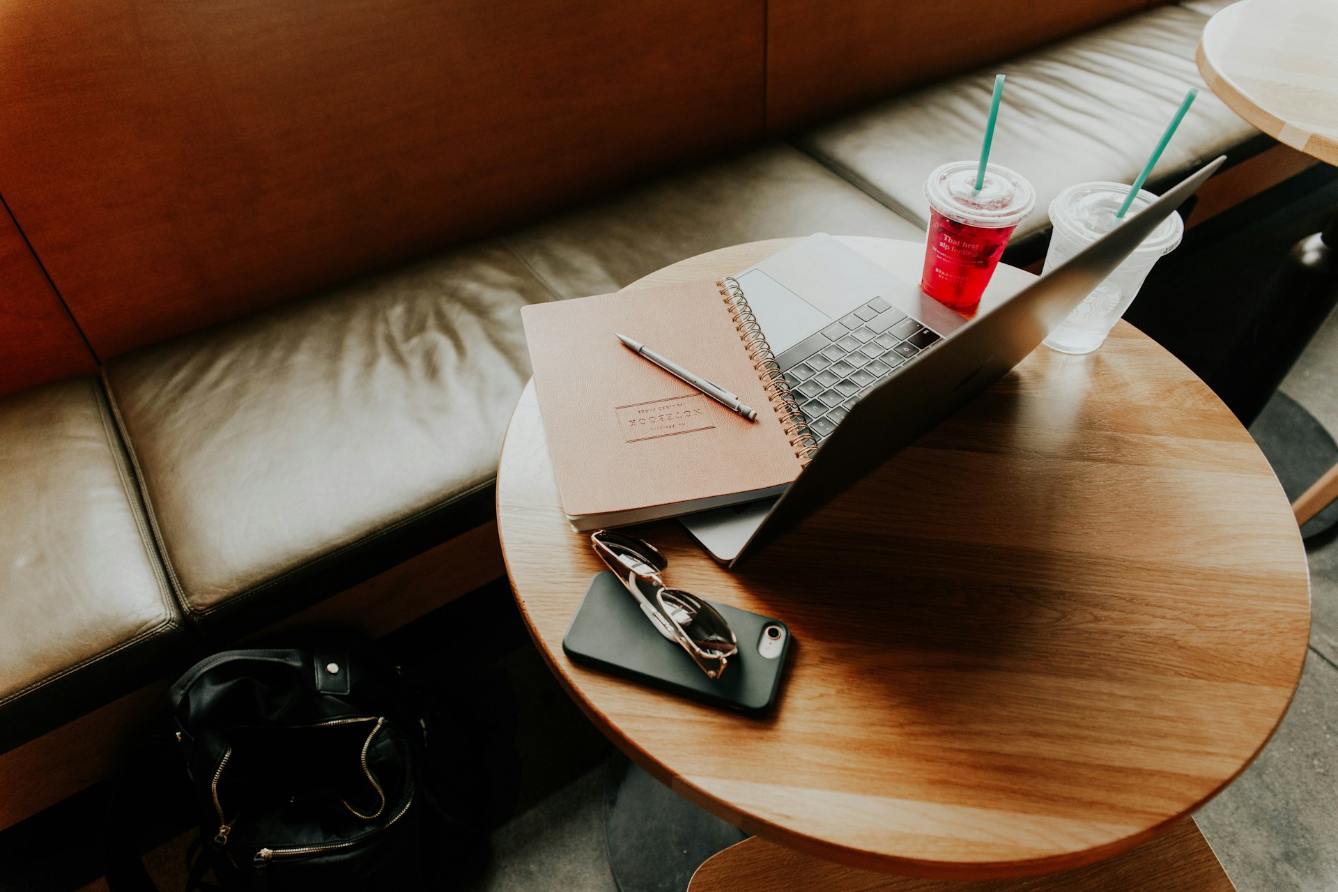 Two palm trees against a clear blue sky