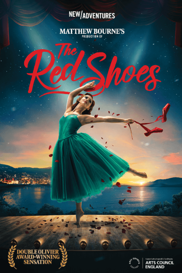 Ballet dancer on stage with red shoes in hand, backdrop of sunset over a lake, "The Red Shoes" text above.
