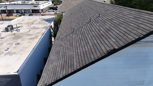 Overview: wider view of the shingle roof