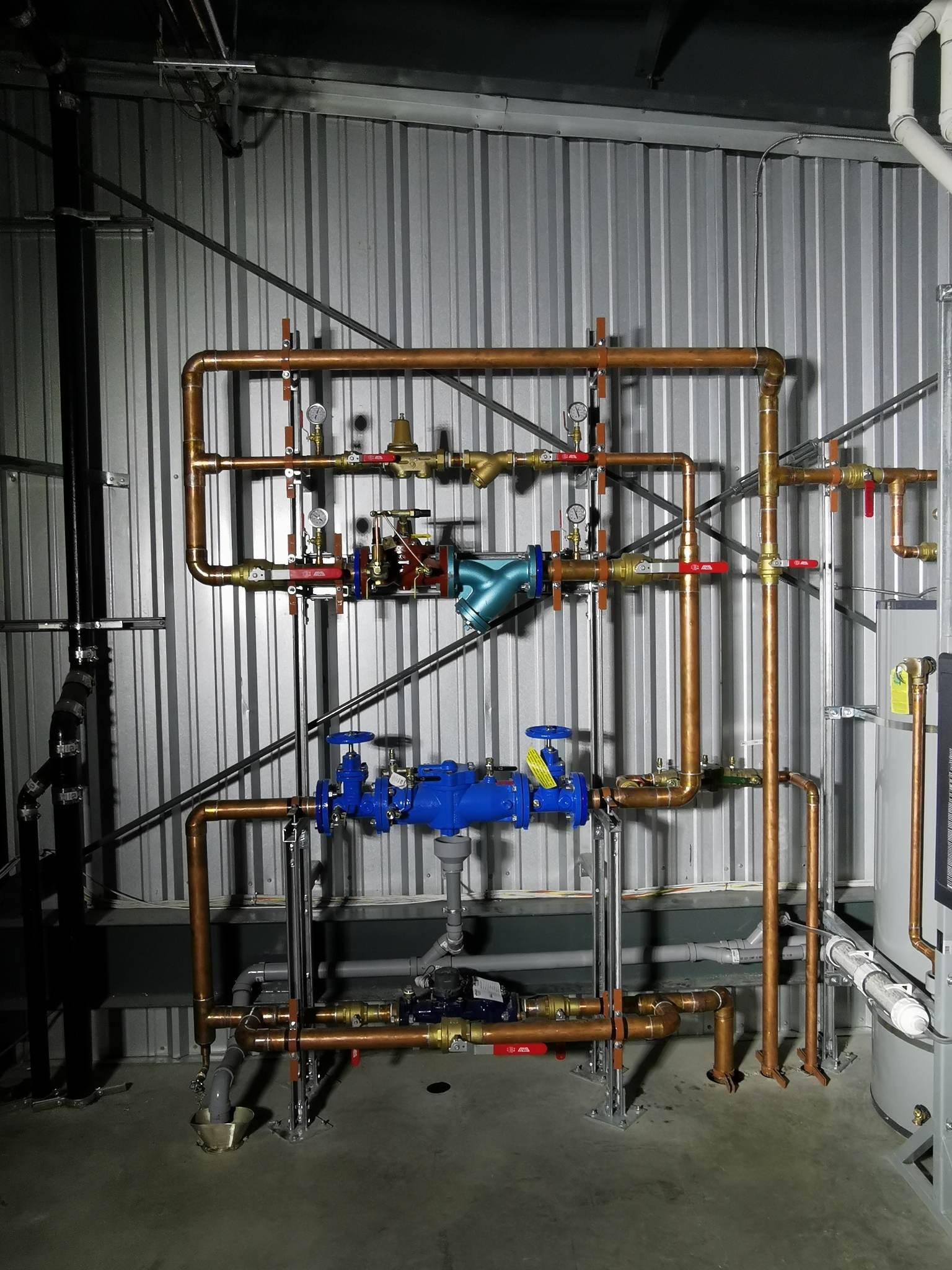 Industrial copper pipes and valves installed for HVAC and plumbing in Chilliwack, Fraser Valley, British Columbia.