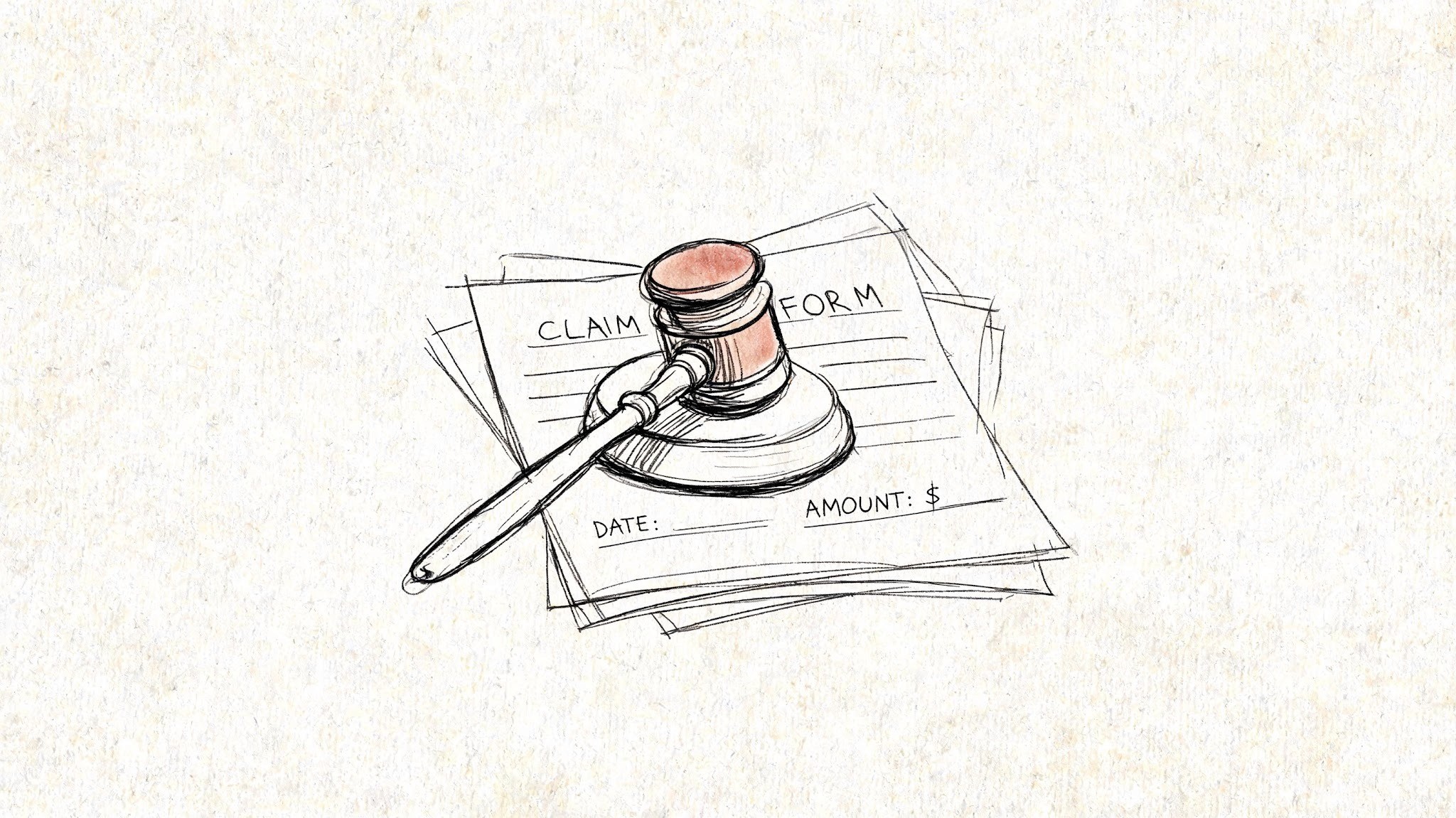 A gavel resting on top of a legal document labeled as a claim form on paper.