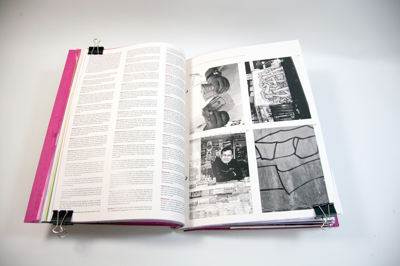 an opened book with a lot of paragraphs of text on the left and four black and white images on the right