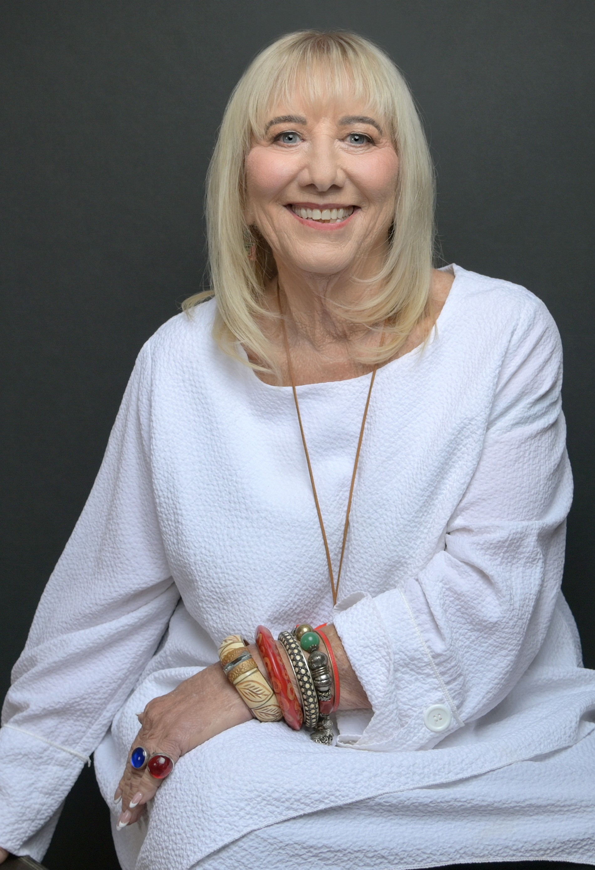image of eileen in a white sweater