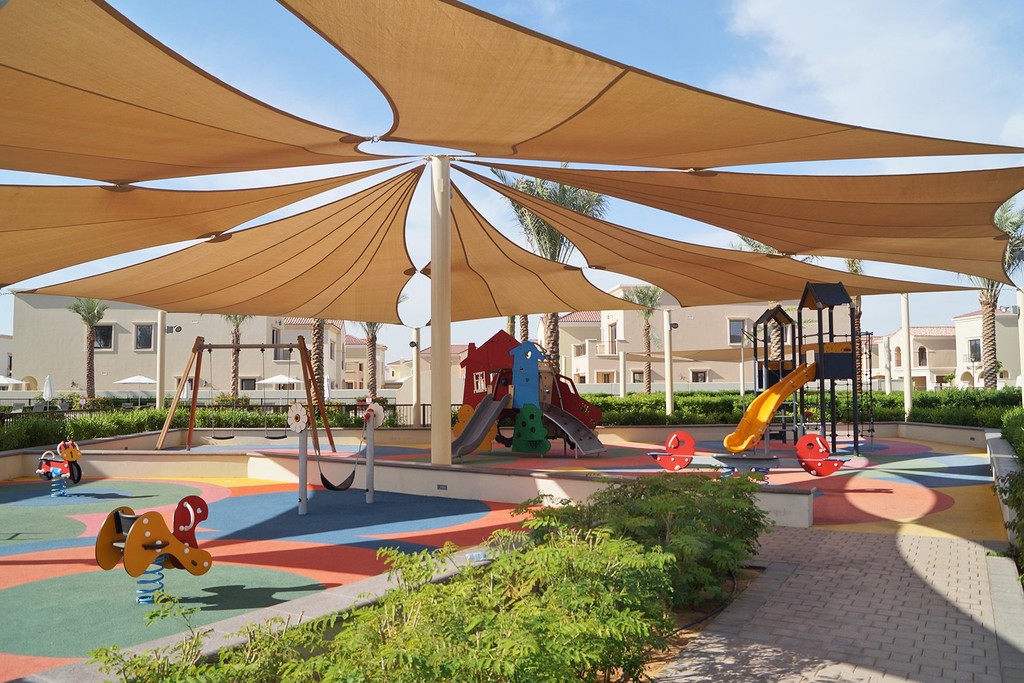 Outdoor activities at Arabian Ranches 2, featuring lush landscapes and recreational facilities for families and individuals.
