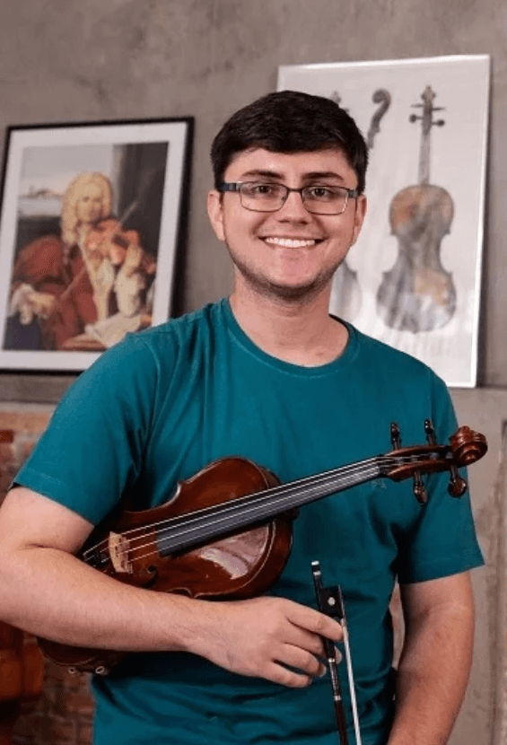 baby playing multicolored xylophone toy