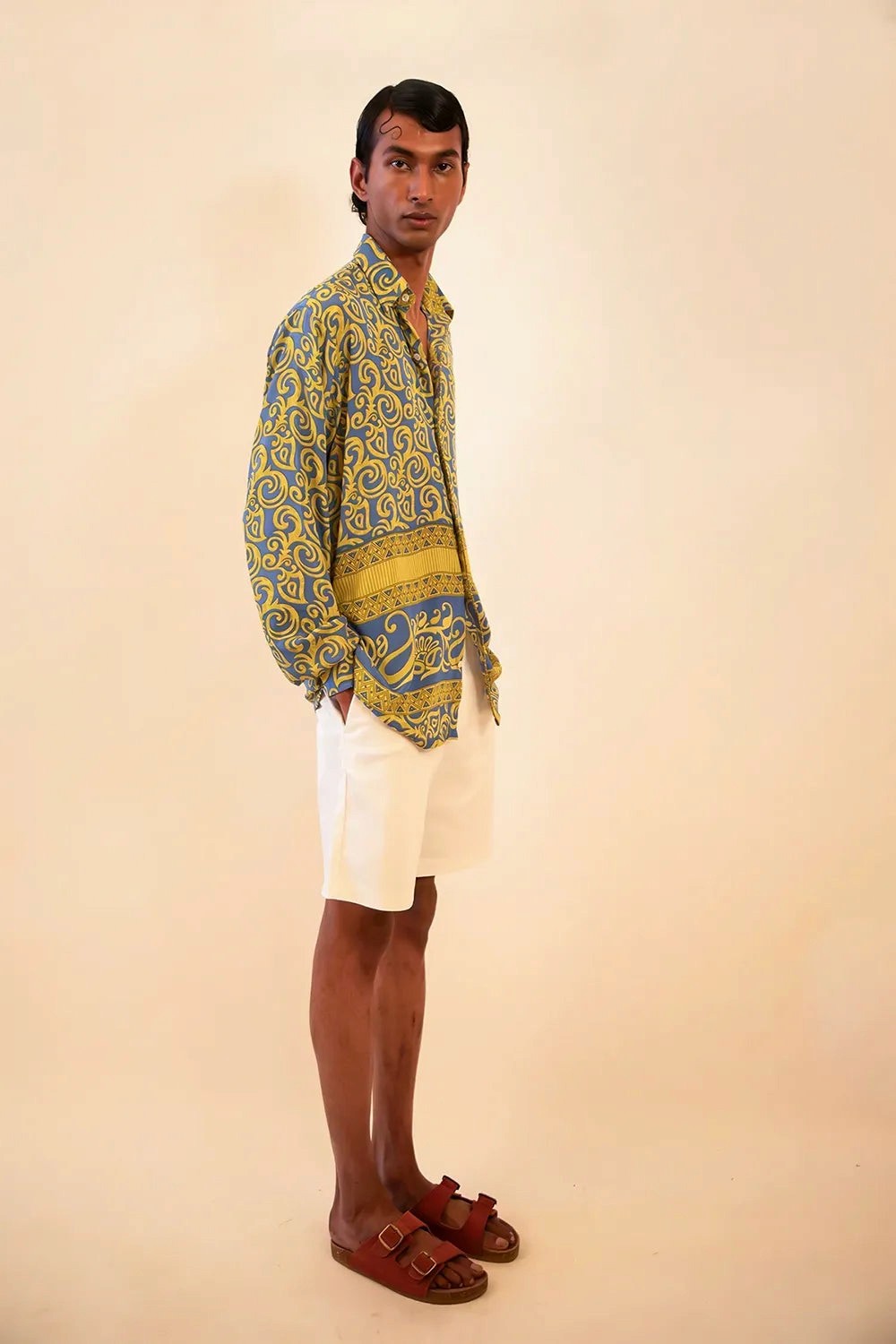 Lavya is our one-of-a-kind baroque-printed silk shirt, handcrafted by skilled artisans in-house using a vintage silk sari. 