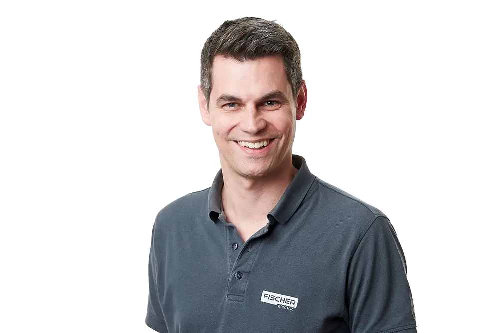 Portrait de Stephan Schaller avec le polo de Fischer Electric
