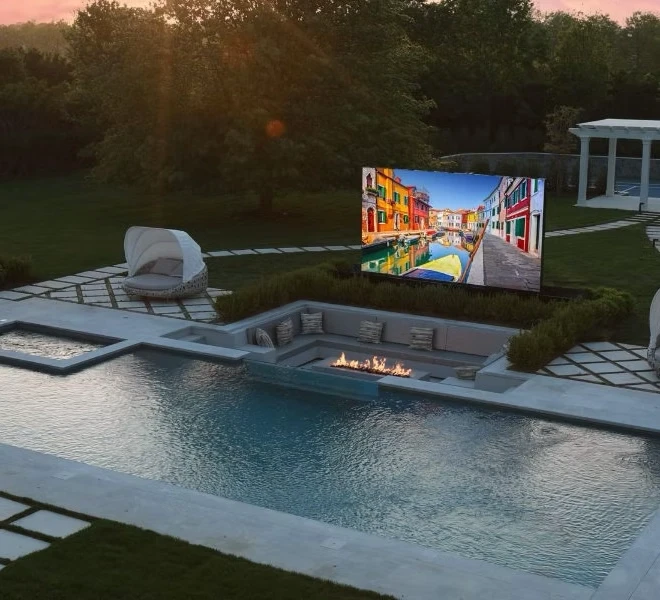 A group of people sitting around a hot tub