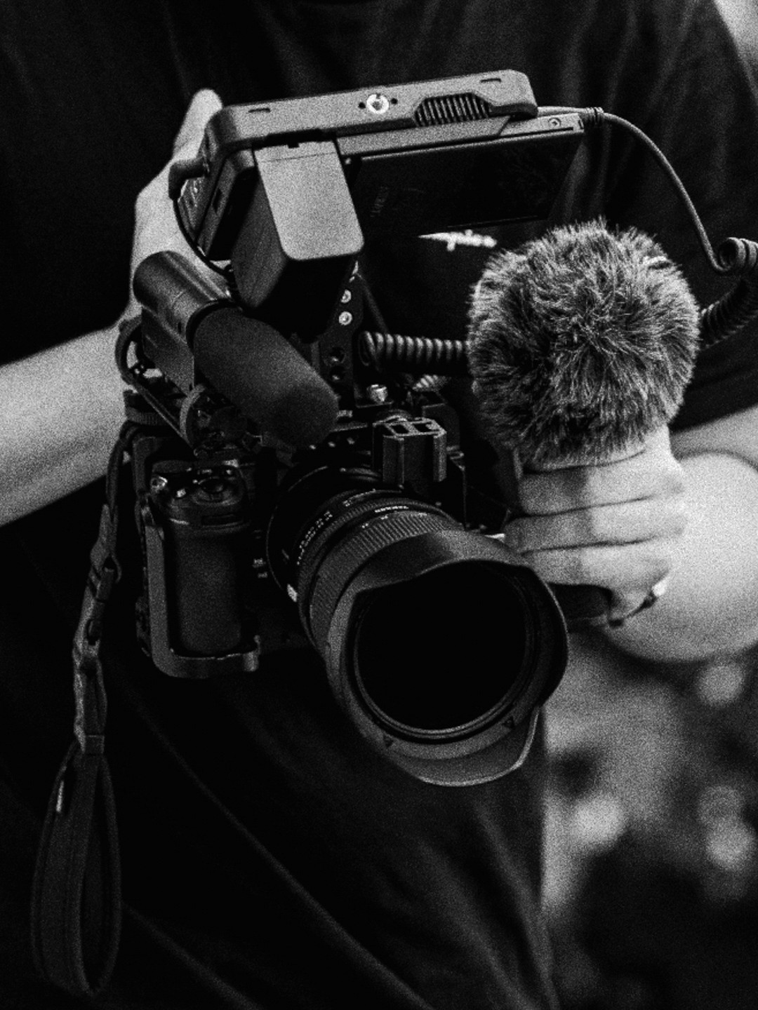 Black-and-white image of a camera mounted on a rig