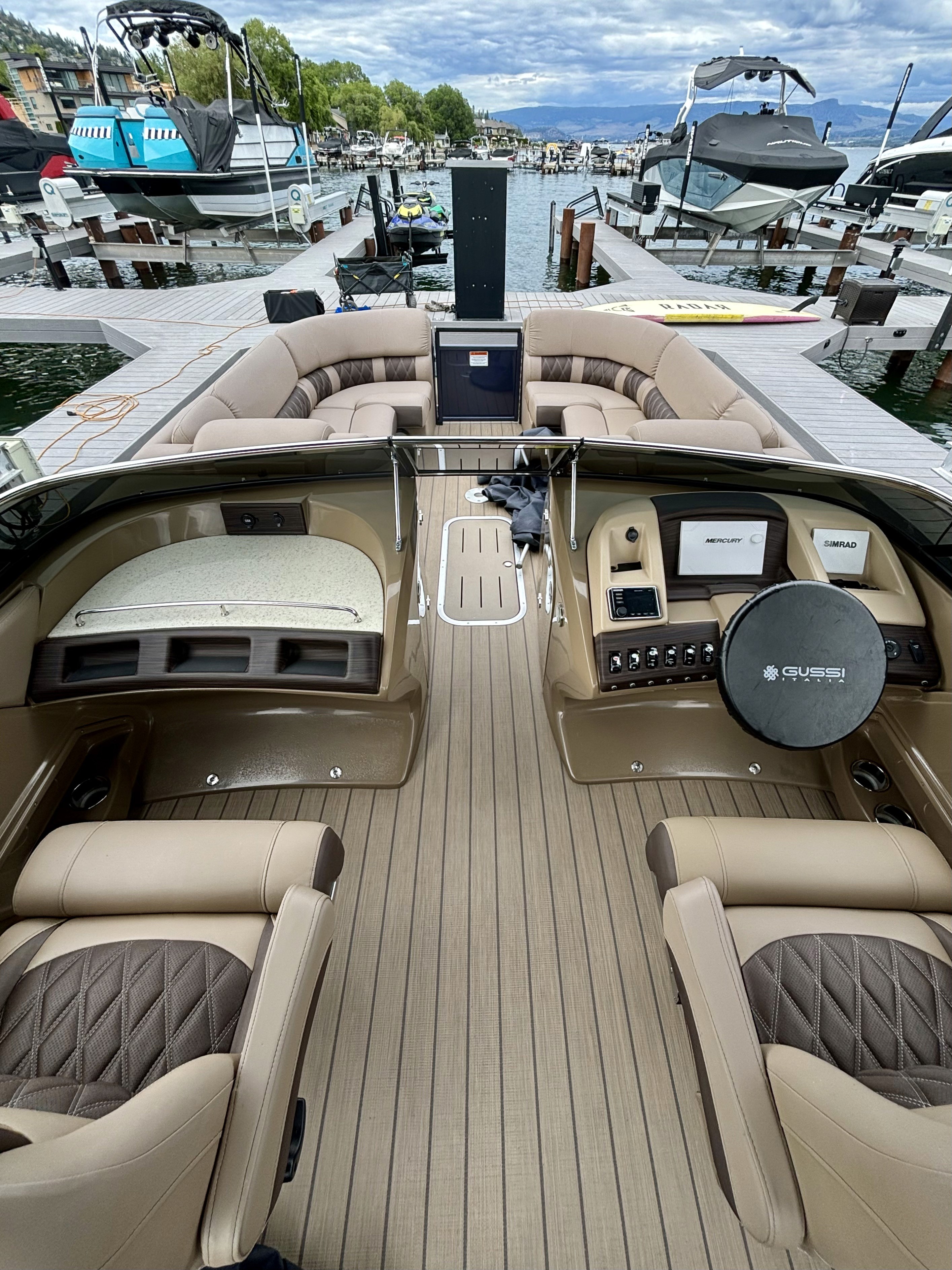 An above view of the inside of a pristine clean interor detail on a pontoon boat