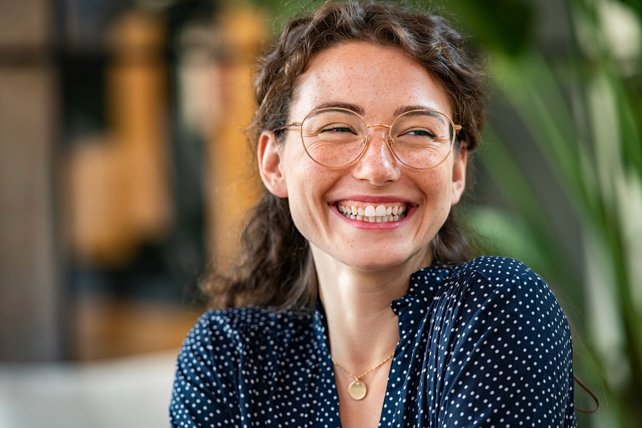 Healthy woman wearing glasses smiling