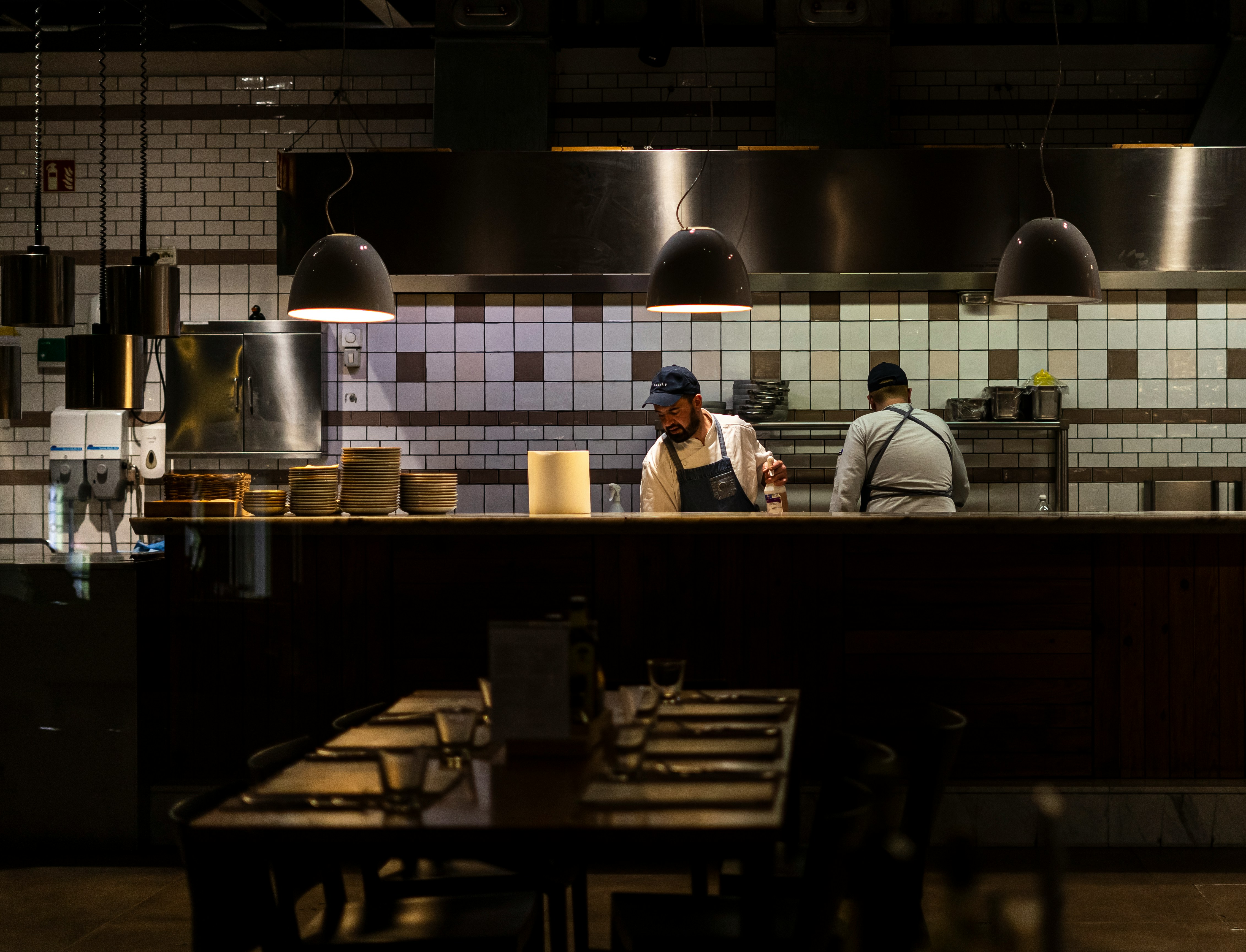 Chefs working in a modern restaurant kitchen