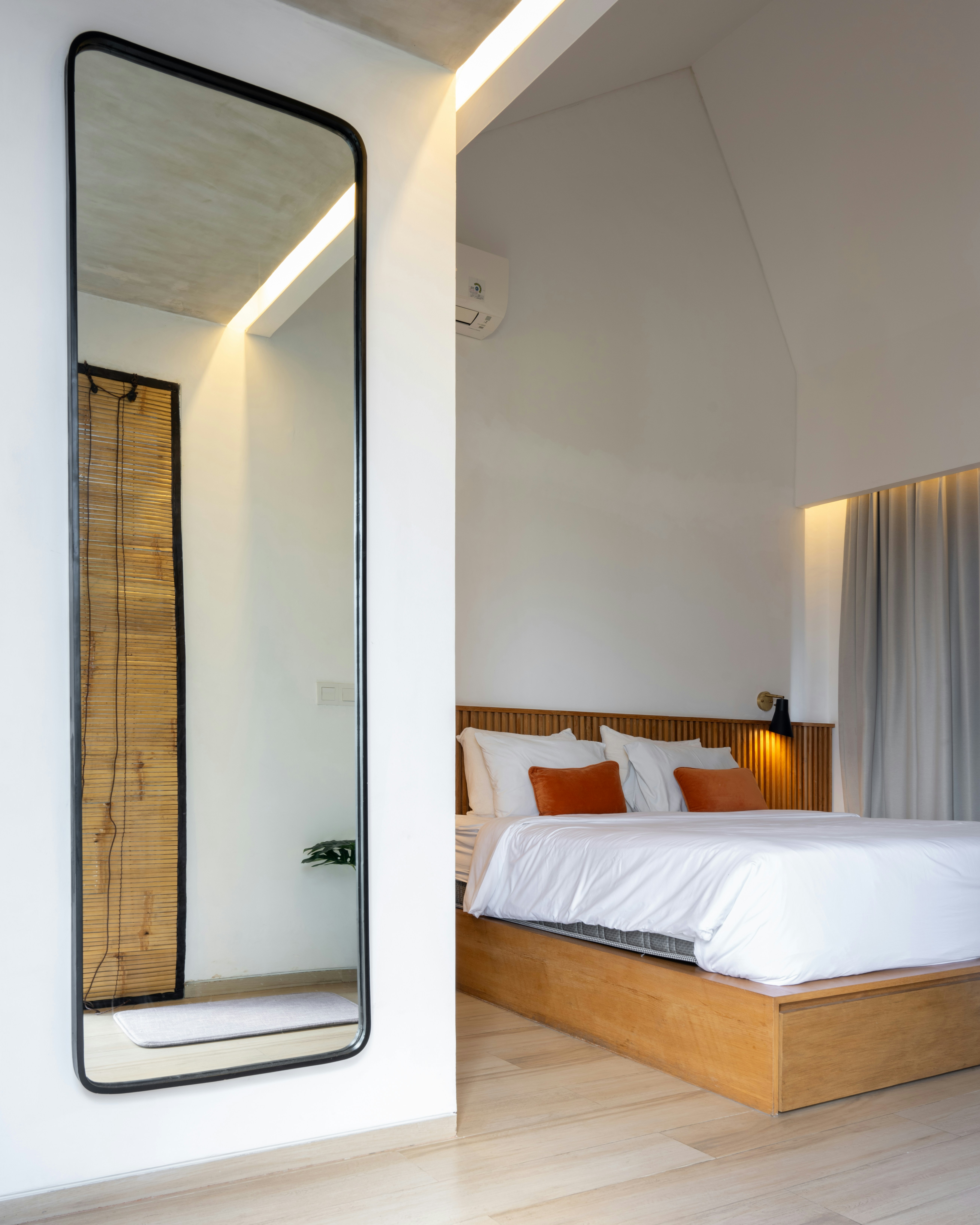 Bedroom with a modern design and neutral color palette.