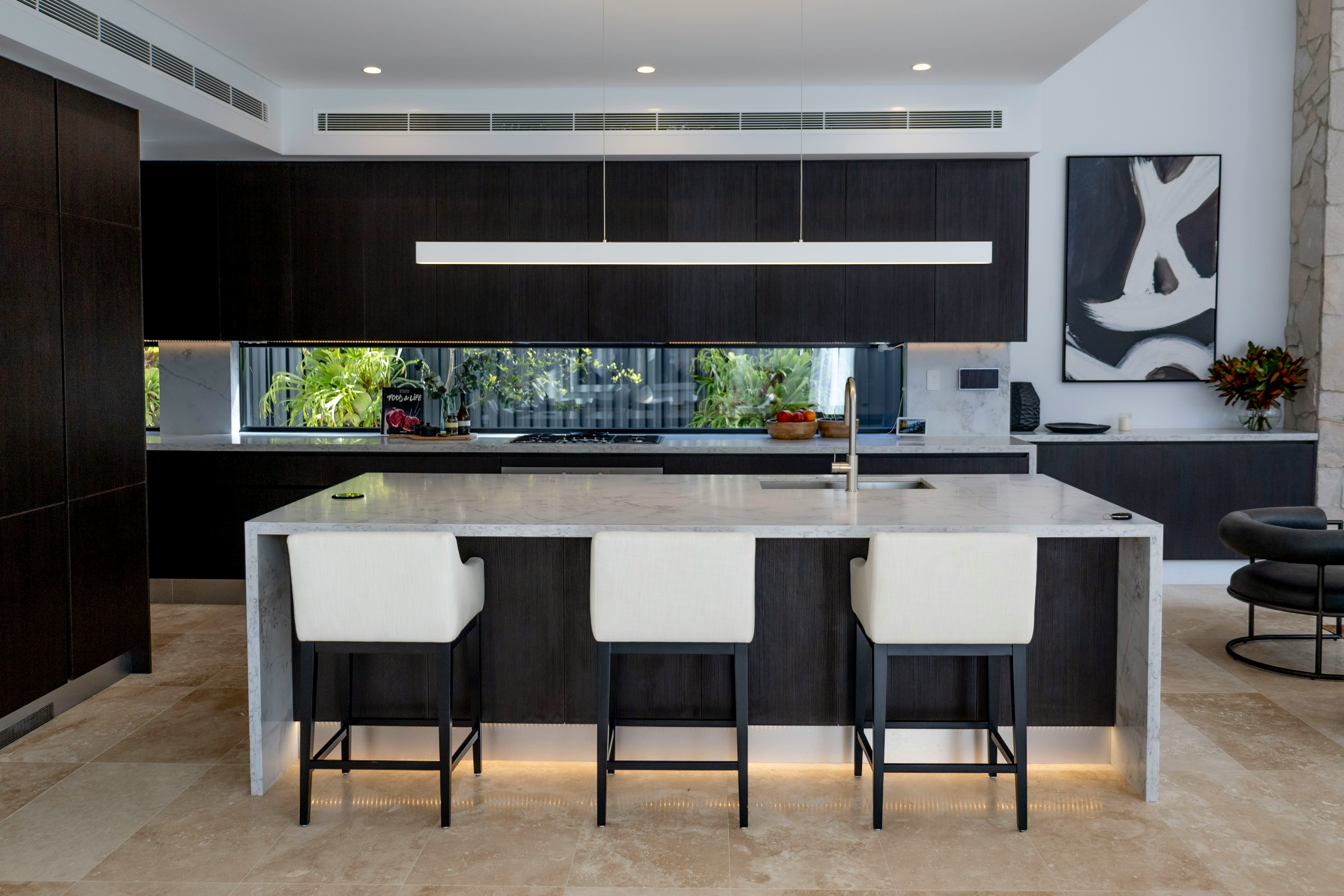 Modern Kitchen Haven showcasing sleek countertops, spacious cabinetry, and energy-efficient appliances.