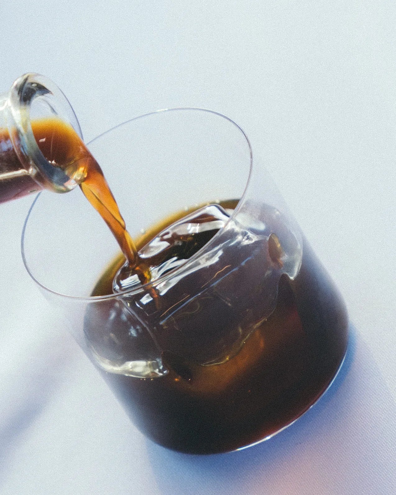 GRADA 01 Single Origin — bottle in context with espresso martini coupe.
