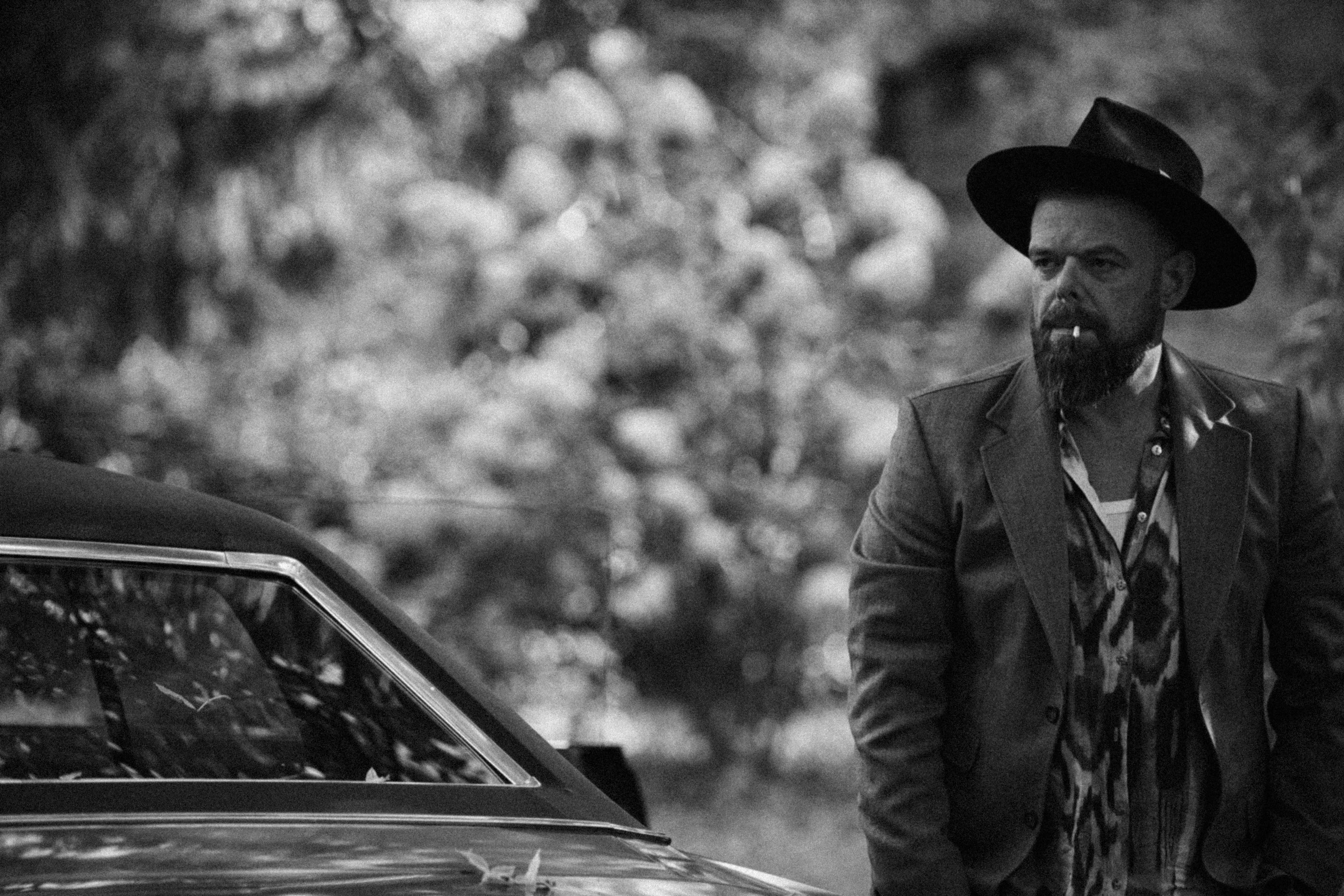 a man holding a cocktail