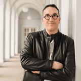 Portrait of Lisa Schmidt, a satisfied client featured in testimonial.