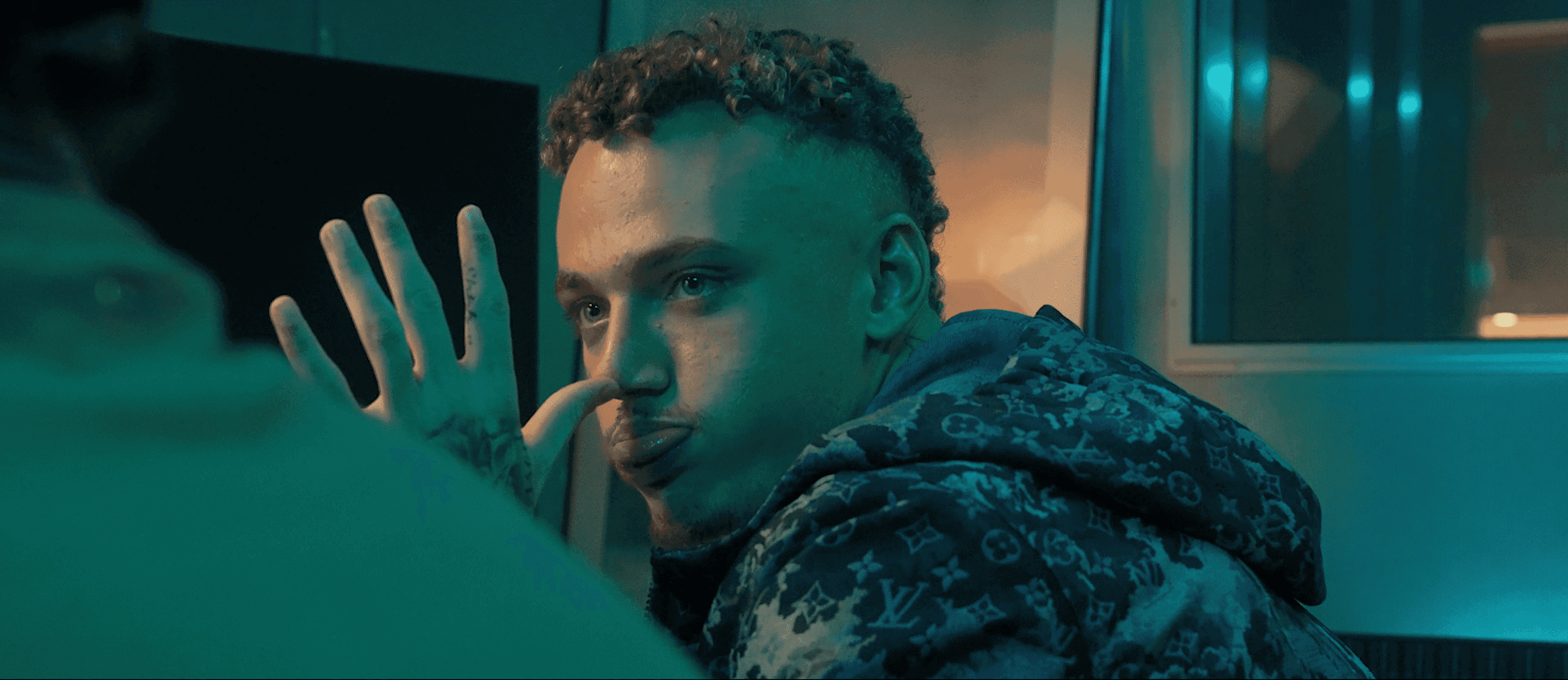 Streetside billboard with flyposters of the Batch.Works brand and illustrations