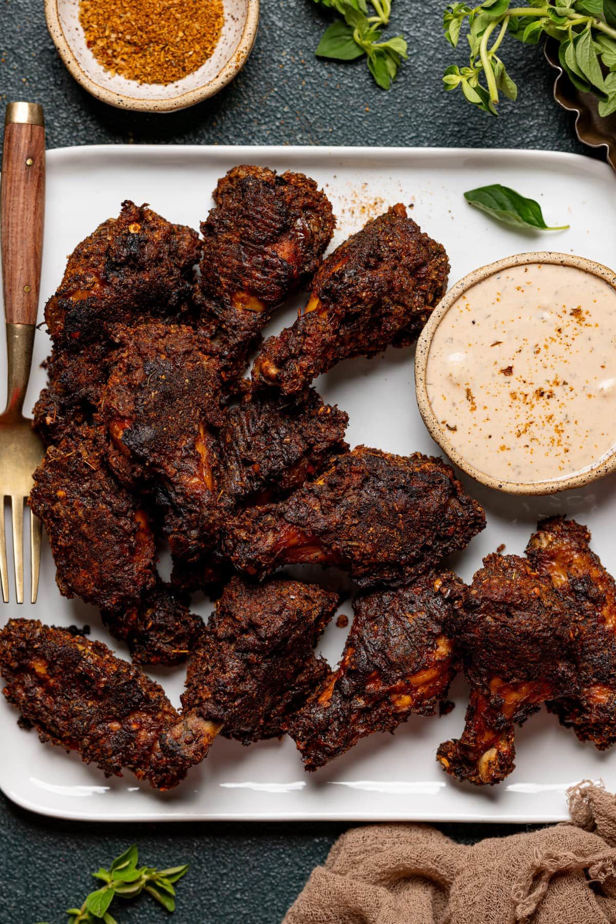 Cajun Dry Rub Chicken Wings from Pasta 9 Toronto seasoned with smoky Cajun spices for a bold peppery finish.
