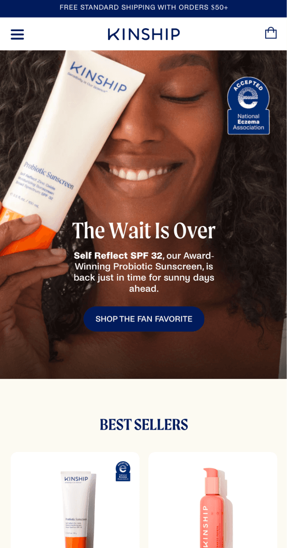 Mobile homepage hero for Kinship skincare featuring product imagery and “The World’s First” messaging