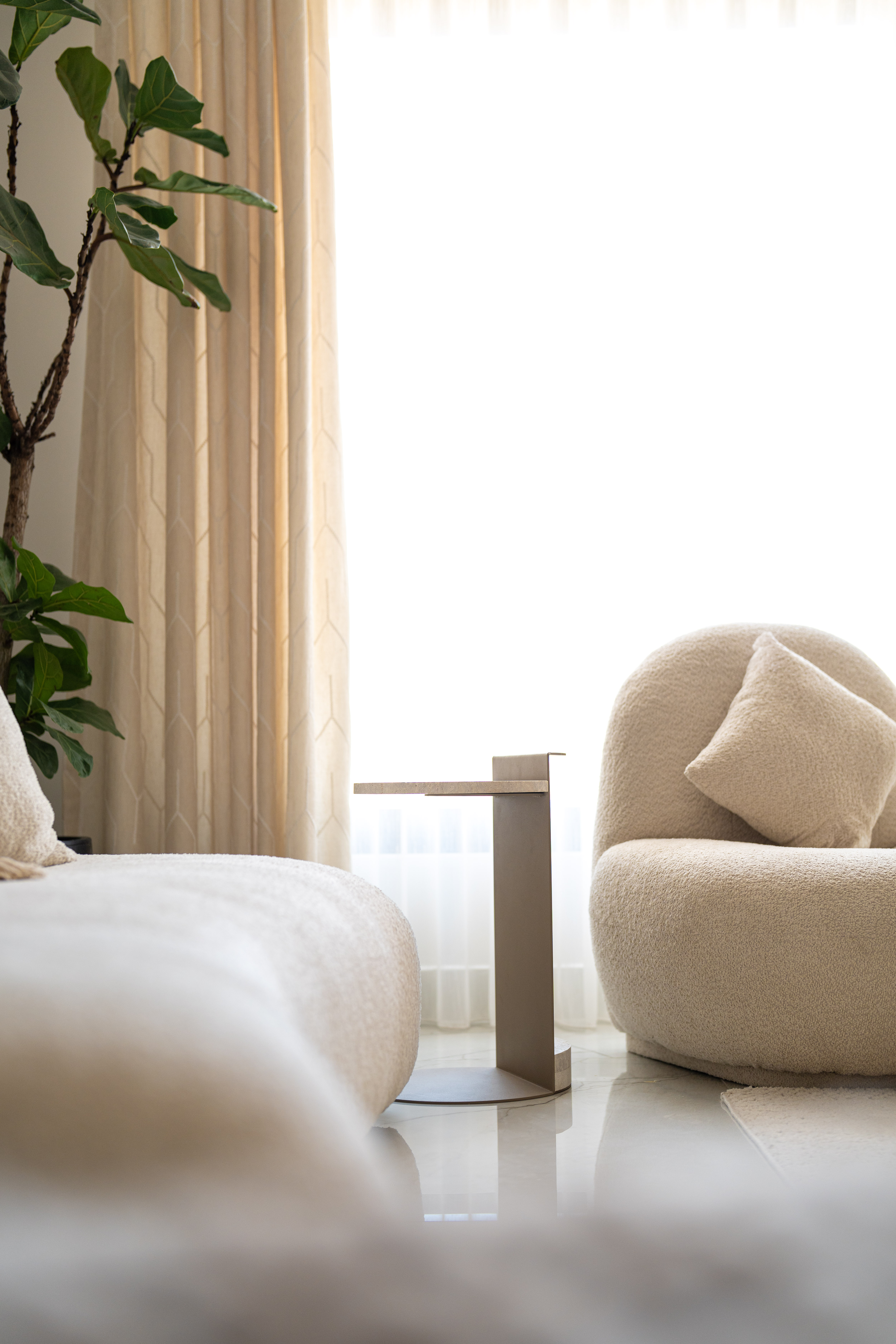 A moody scene of a room with a lamp shade