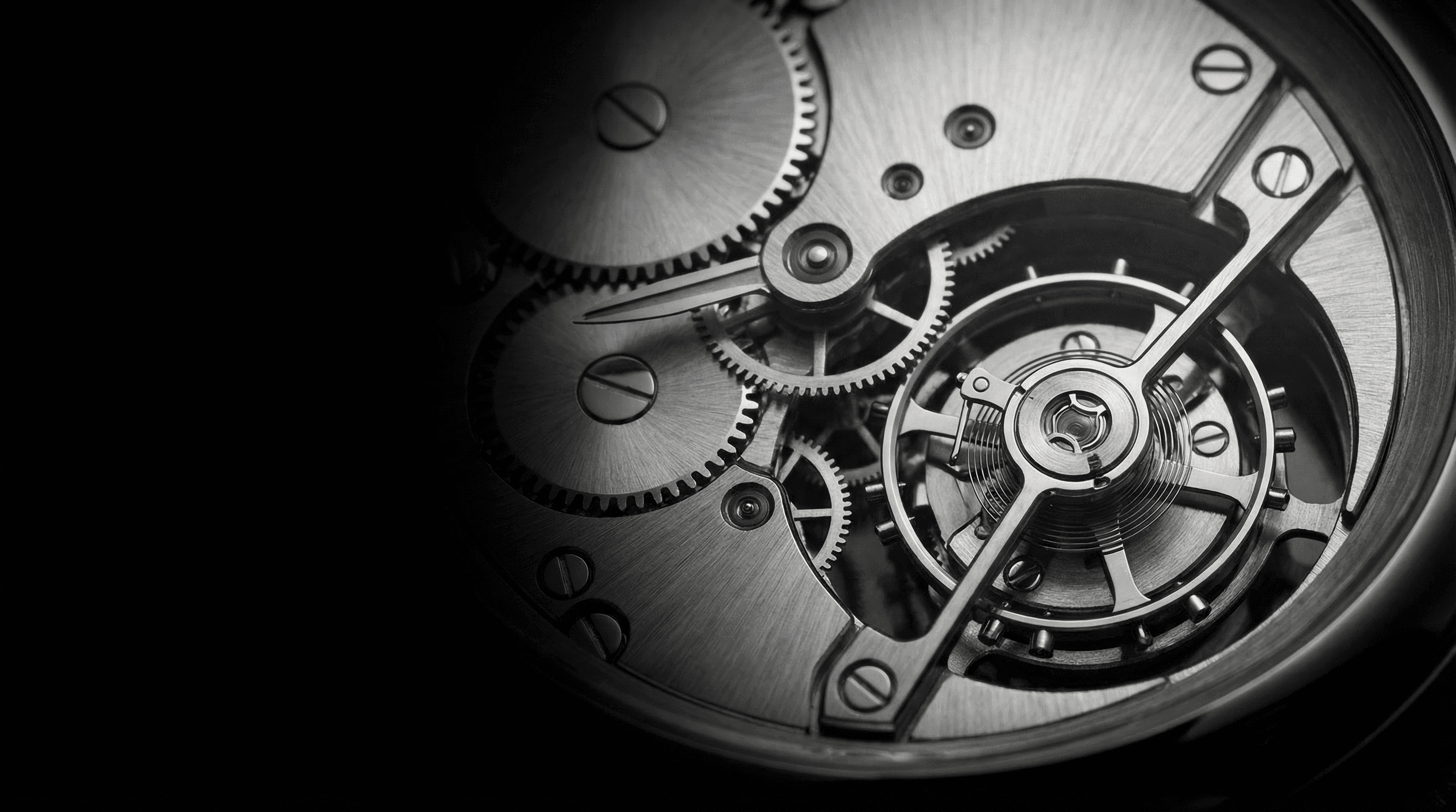 Smiling young woman with long hair standing against a dark green background, holding a finger to her chin.