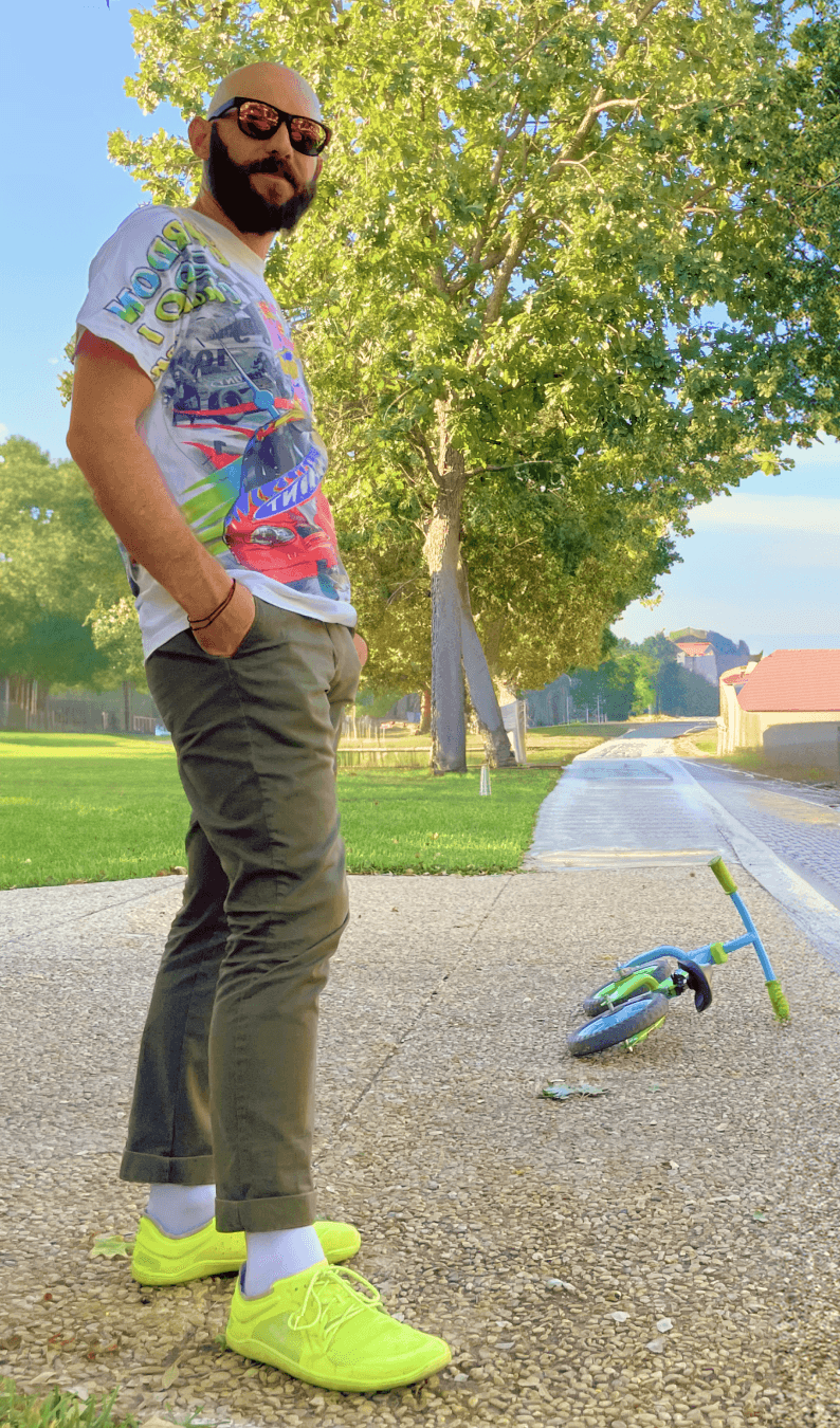 dave standing next to a really small bike