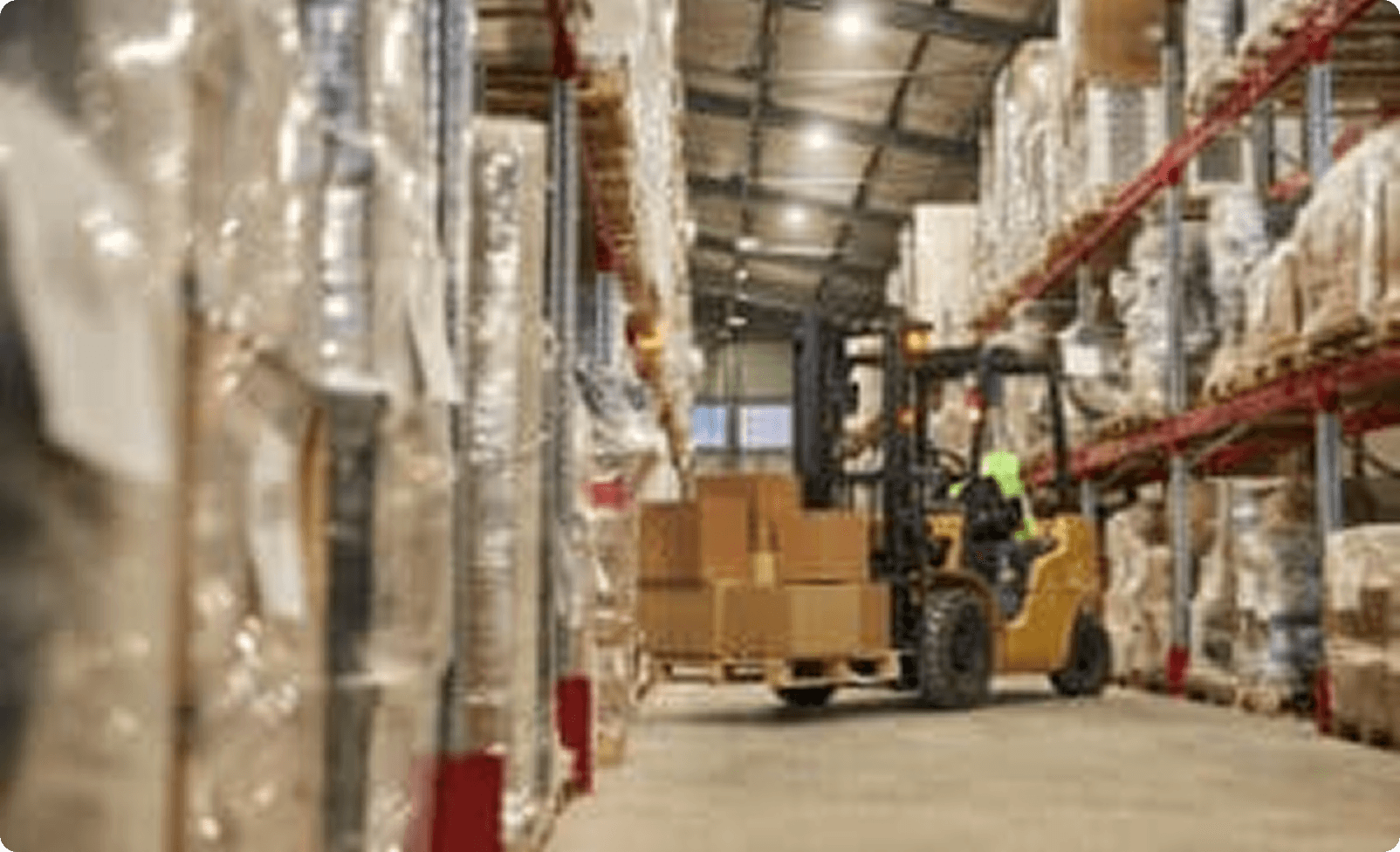 Background image of warehouse interior with forklift carrying boxes, copy space