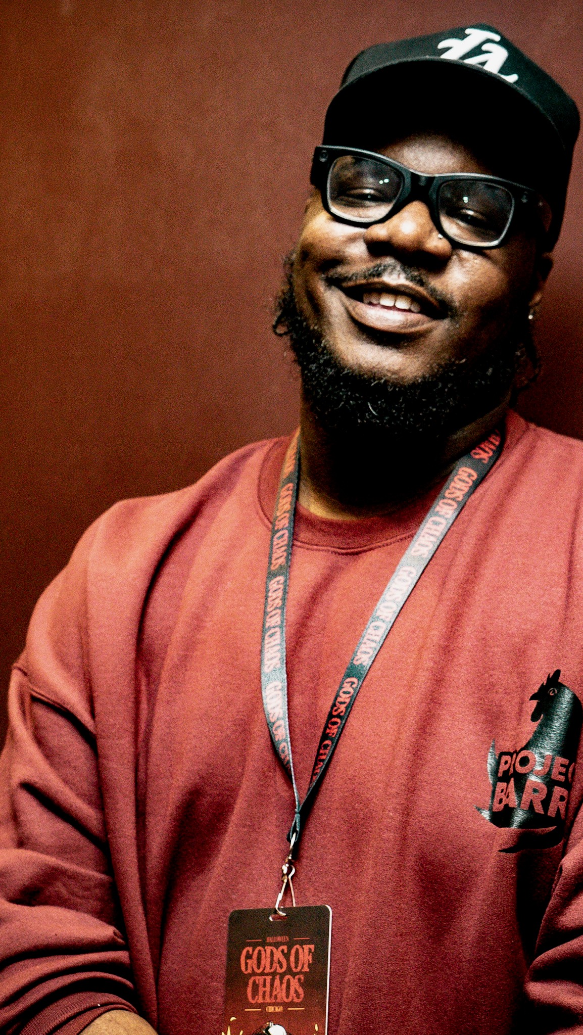 studio image of a lady sitting on a cool sofa