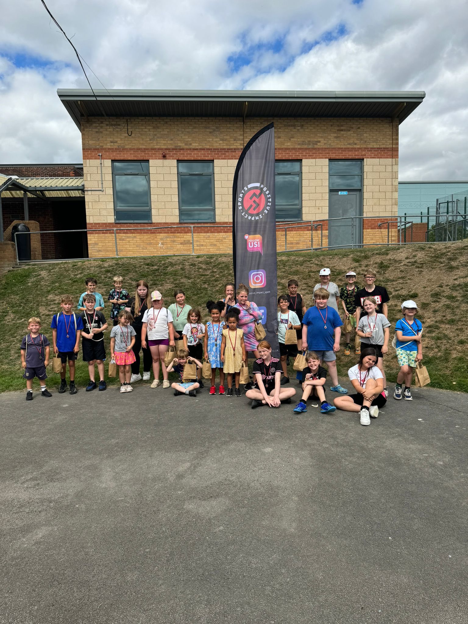 group of women standing on green grass field during daytime