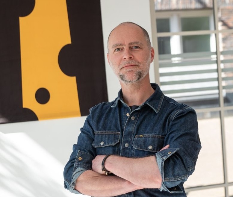 Eddy smiling at camera