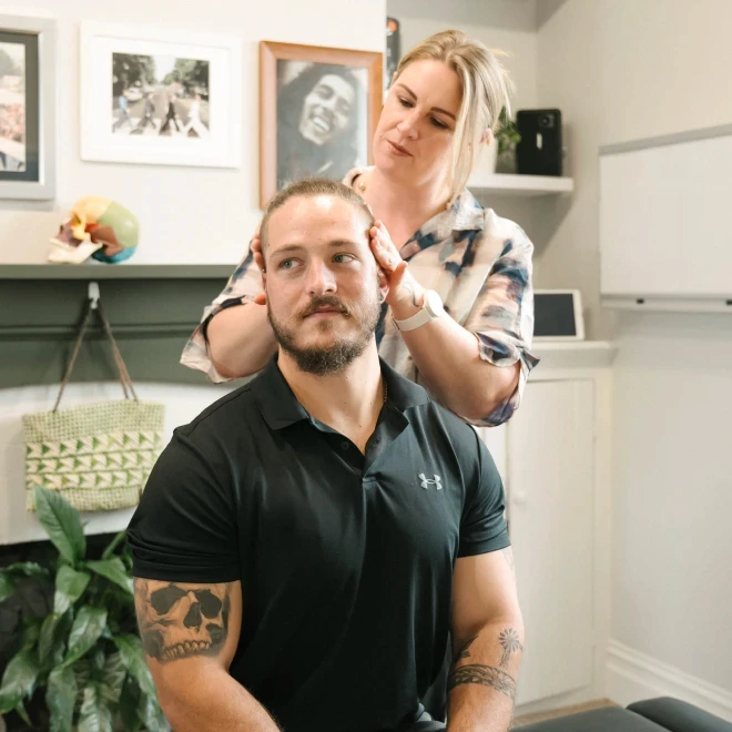 Man getting chiropractic adjustment