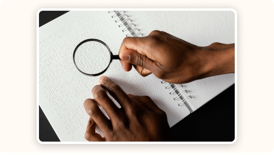 Magnifying glass to read Braille