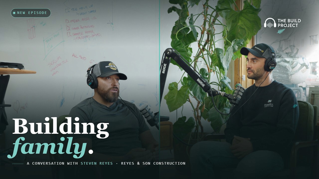 The Build Project episode card: a split frame of two men in caps and headphones at RODE microphones, one seated before a whiteboard of marker punch-list notes, the other beside a large houseplant. Overlaid text reads "Building family" and "A conversation with Steven Reyes, Reyes & Son Construction".