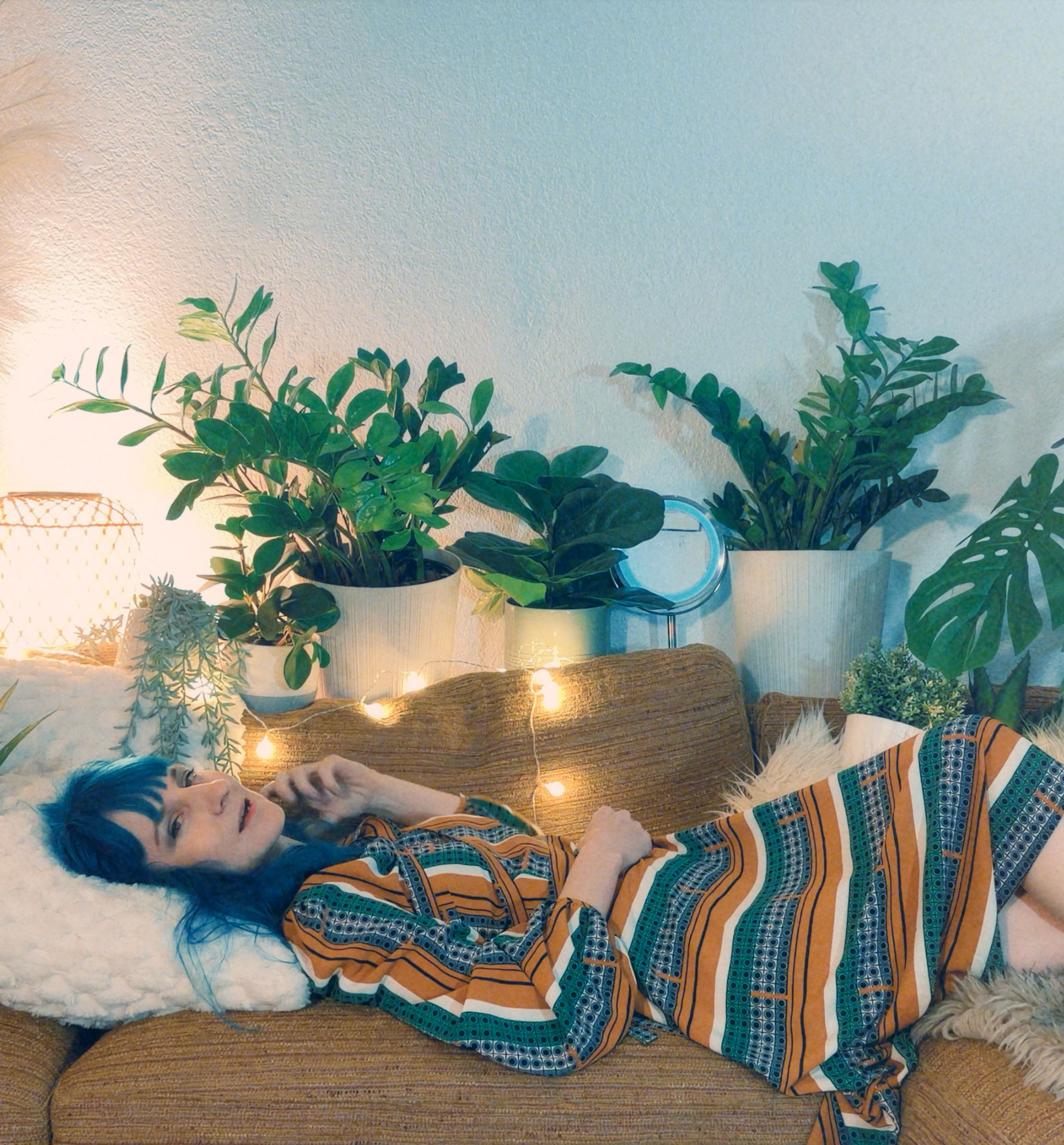 Surreal portrait of man with kaleidoscope effect and neon lighting