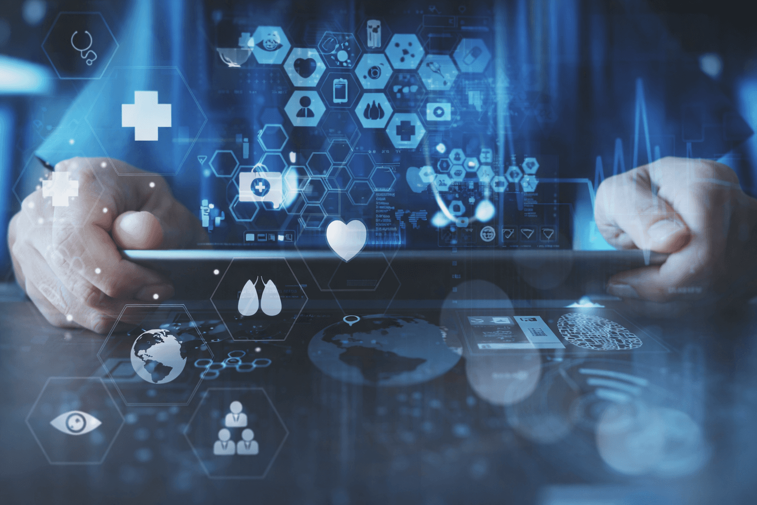 Cell tower against a cloudy blue sky