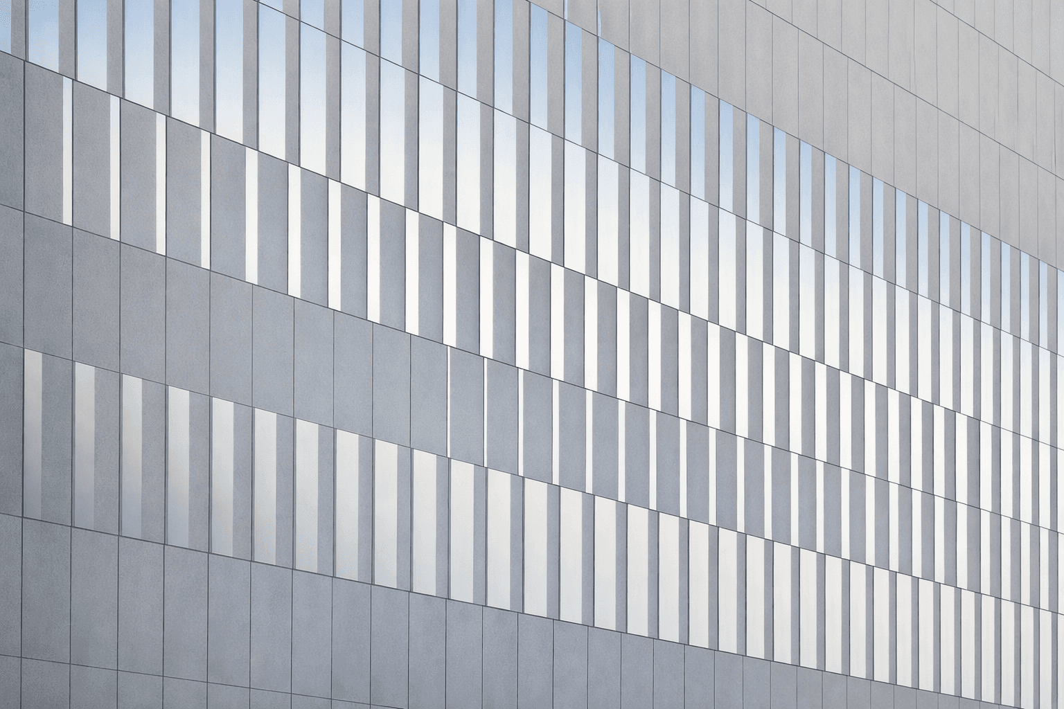 woman holding a phone and man looking at the phone. both are smiling